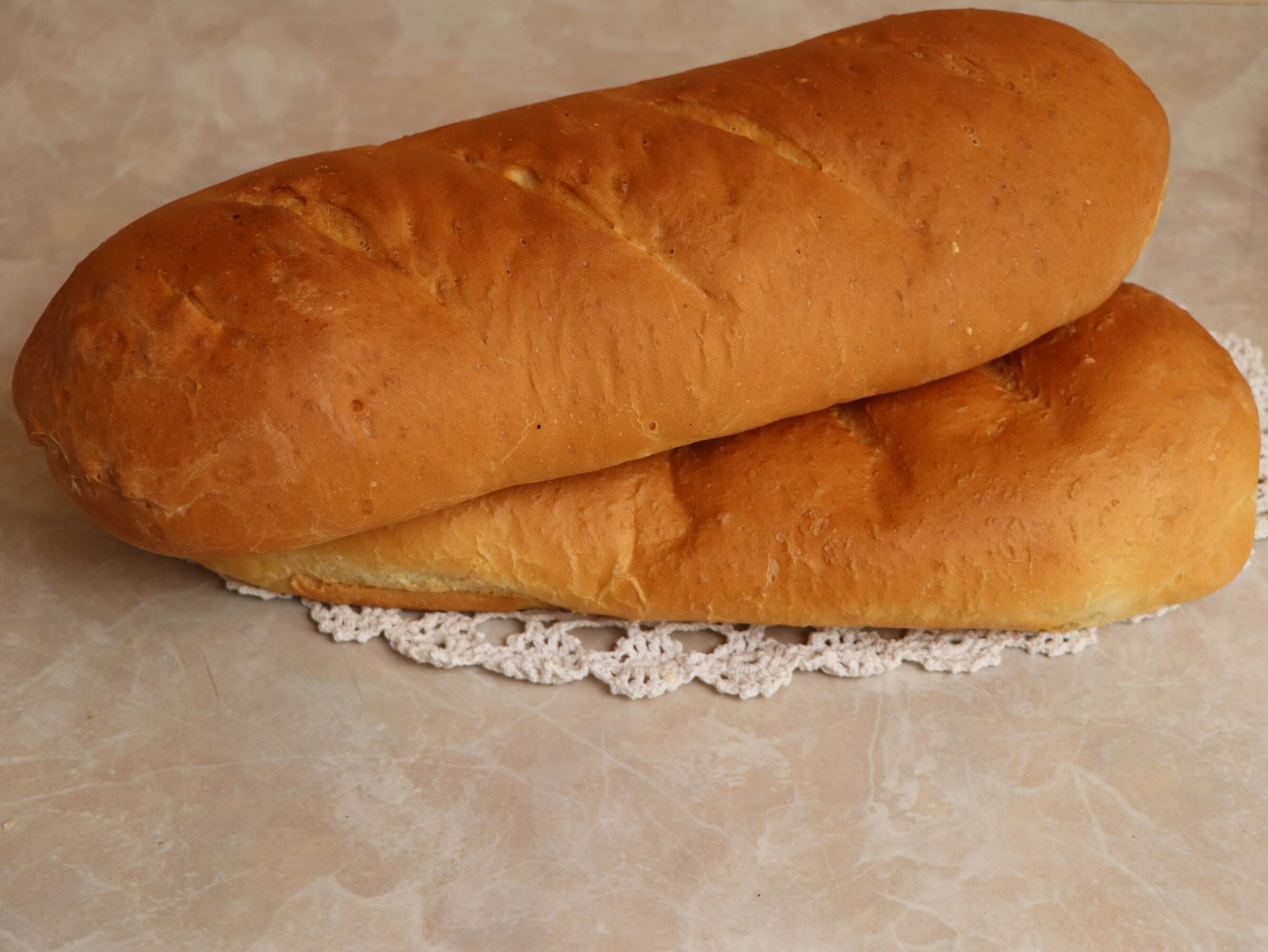 Step 7. Bon appetit. A kilo of homemade bread (or airy batons)