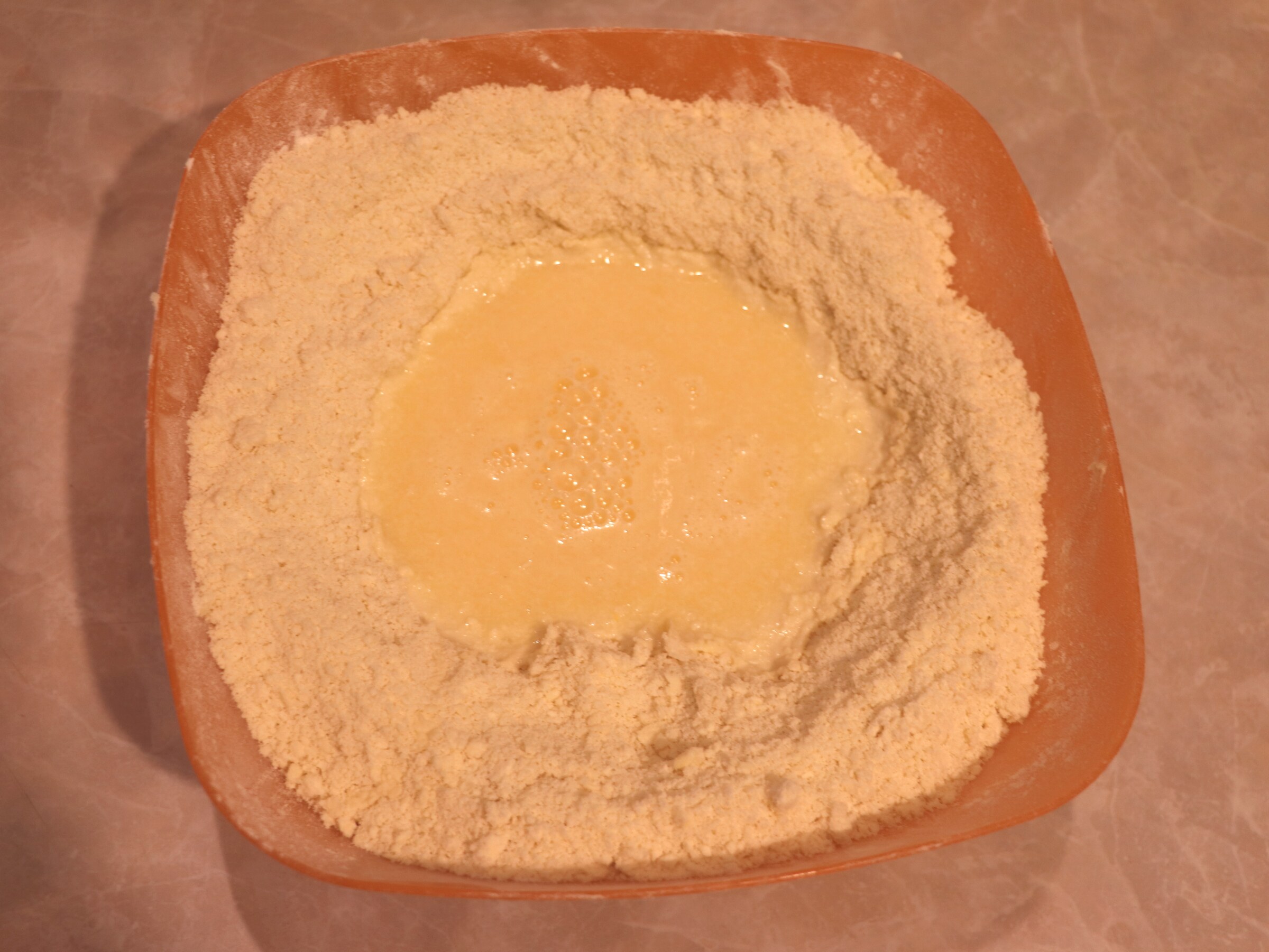 Step 2. Sift the flour into a deep container and grate the butter into the flour using. A Napoleon cake you’ll finish the same day