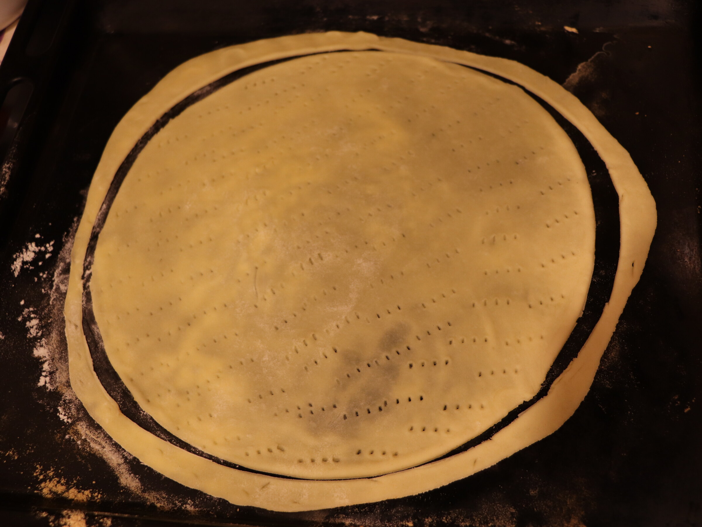 Step 6. Take the chilled dough out of the refrigerator and knead it on a clean surface. A Napoleon cake you’ll finish the same day