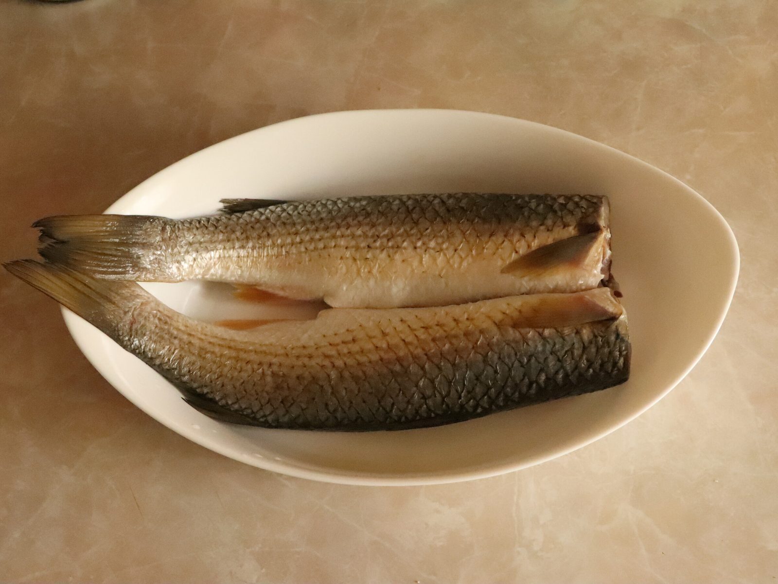 Step 1. A very simple and tasty dish. Baked stuffed grey mullet