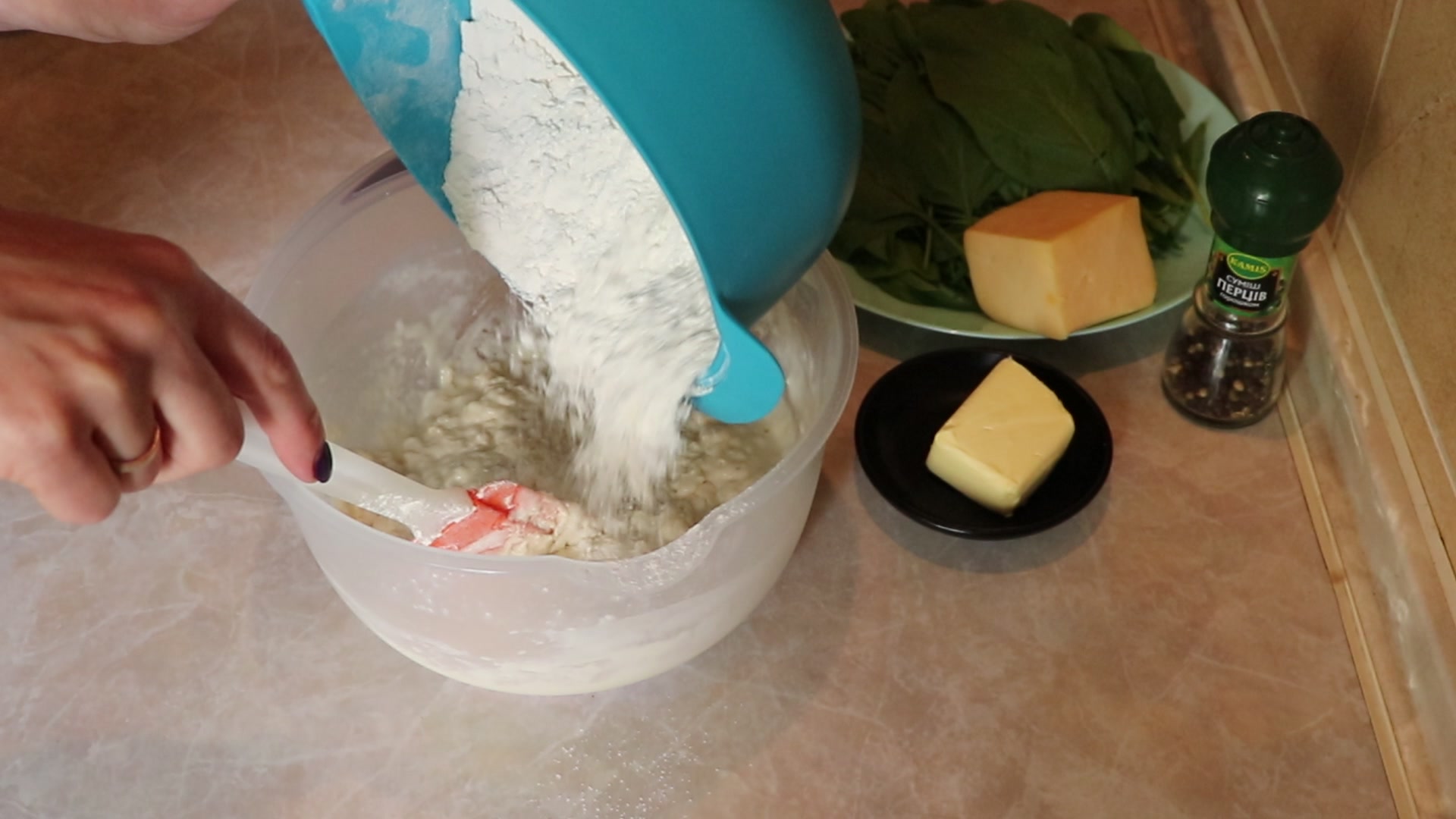 Step 2. Add flour in parts. Cheese and spinach flatbreads (khychiny)