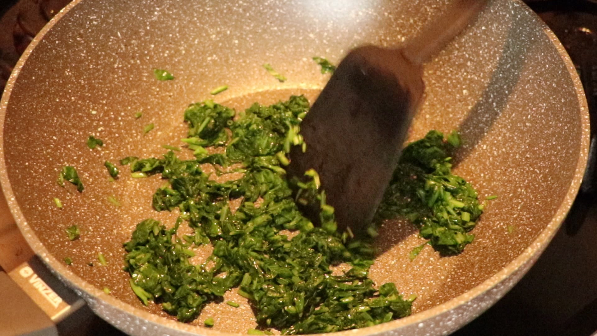 Step 4. Chop the spinach not too fine and stew in butter about 5 minutes — more a sweat. Cheese and spinach flatbreads (khychiny)