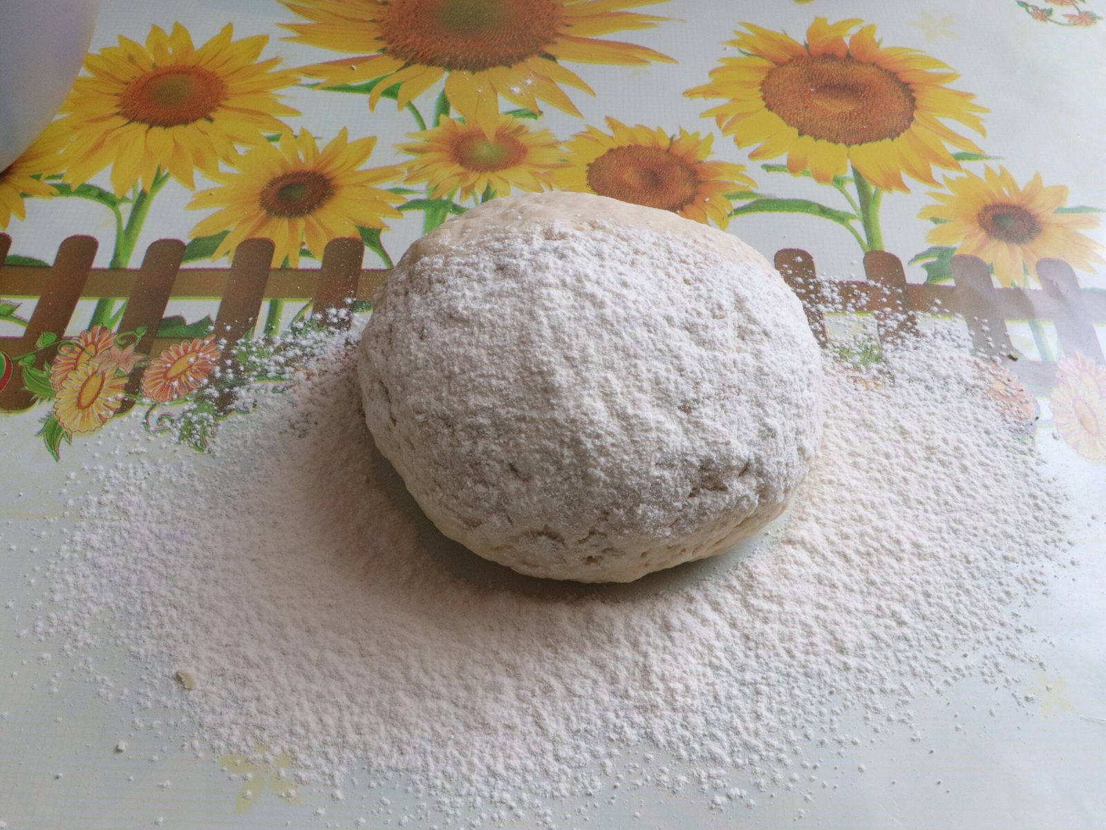 Step 1. Sift the flour into a deep bowl and make a well in the middle. Cherry dumplings (varenyky)