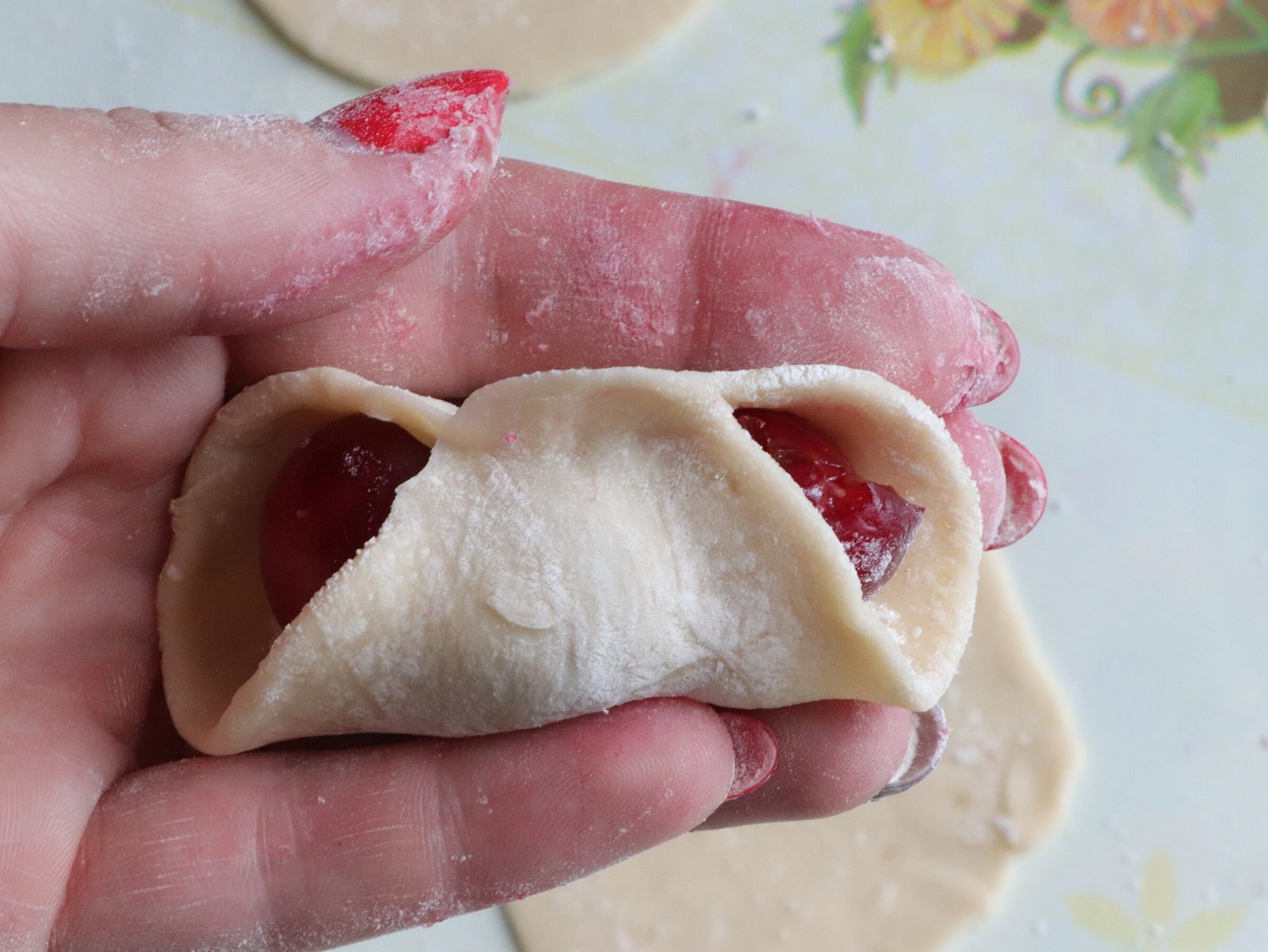 Step 7. While you are making the last batch of dumplings, set the water to boil. Cherry dumplings (varenyky)