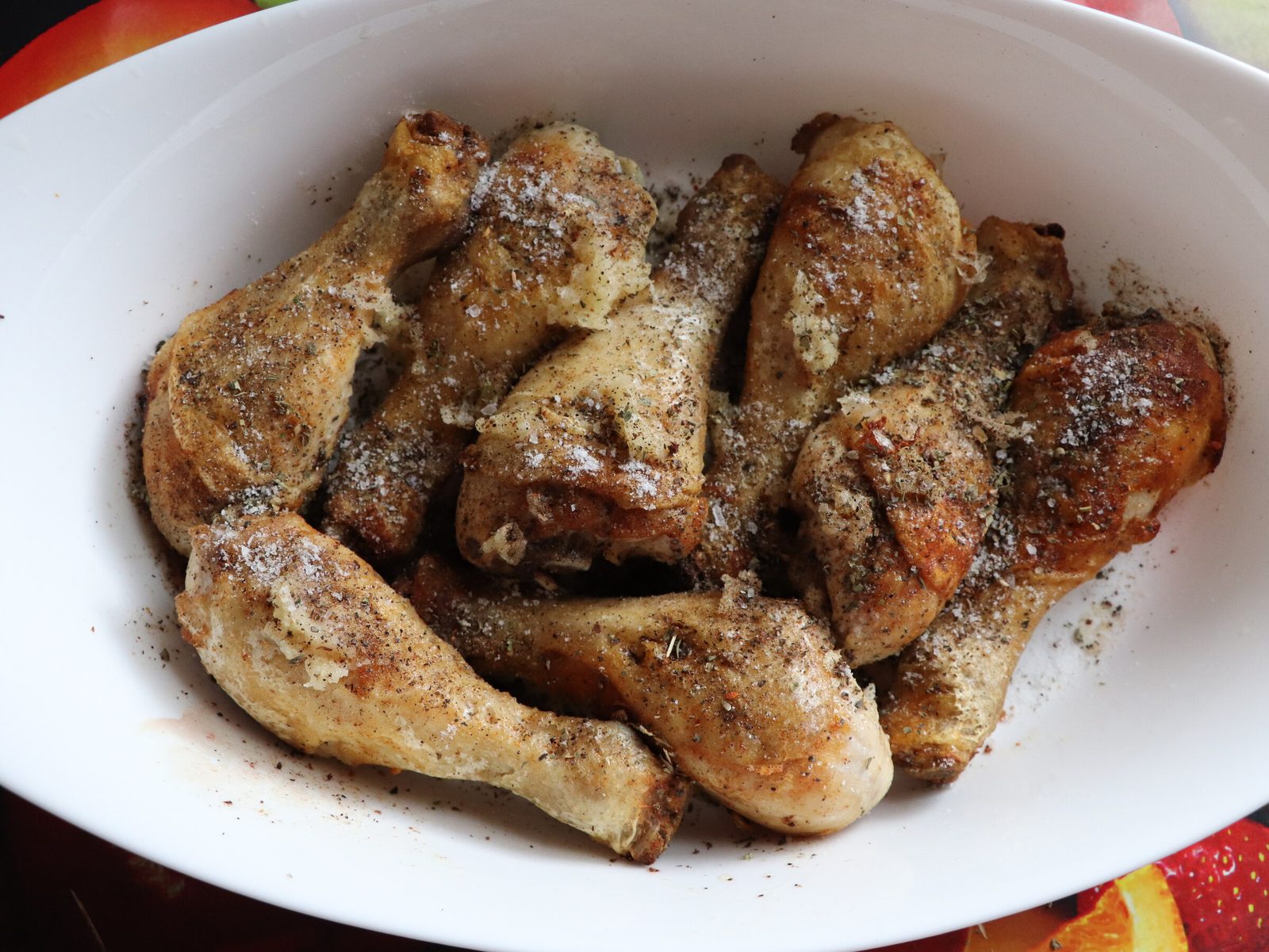 Step 3. Place the fried legs on a baking tray or baking dish. Chicken drumsticks with vegetables in the