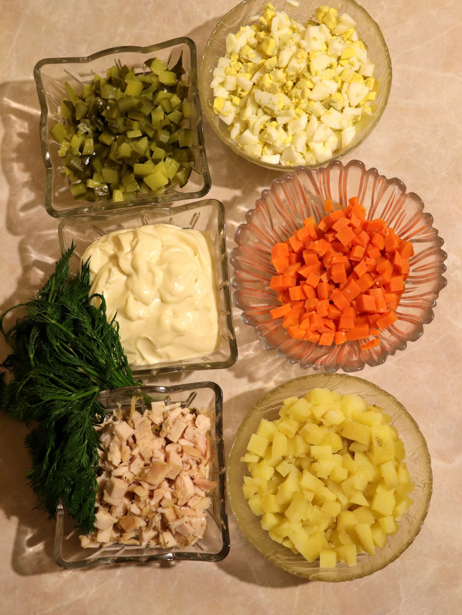 Step 2. To prepare Olivier in a new way, boil all vegetables except cucumbers until. Chicken Olivier salad