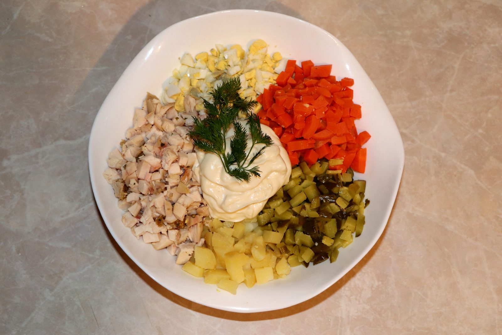 Step 3. Peel the cooled vegetables. Chicken Olivier salad