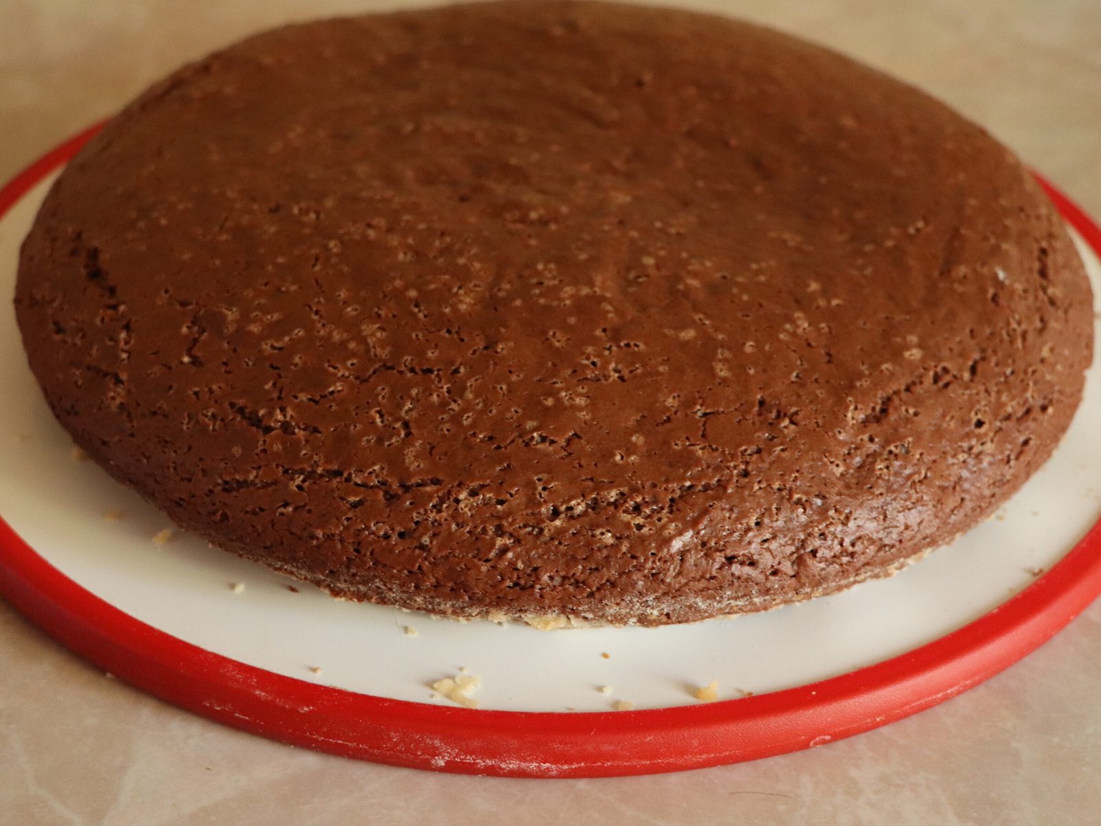 Step 3. For the cream, beat softened butter with boiled condensed milk or butterscotch. Chocolate temptation cake