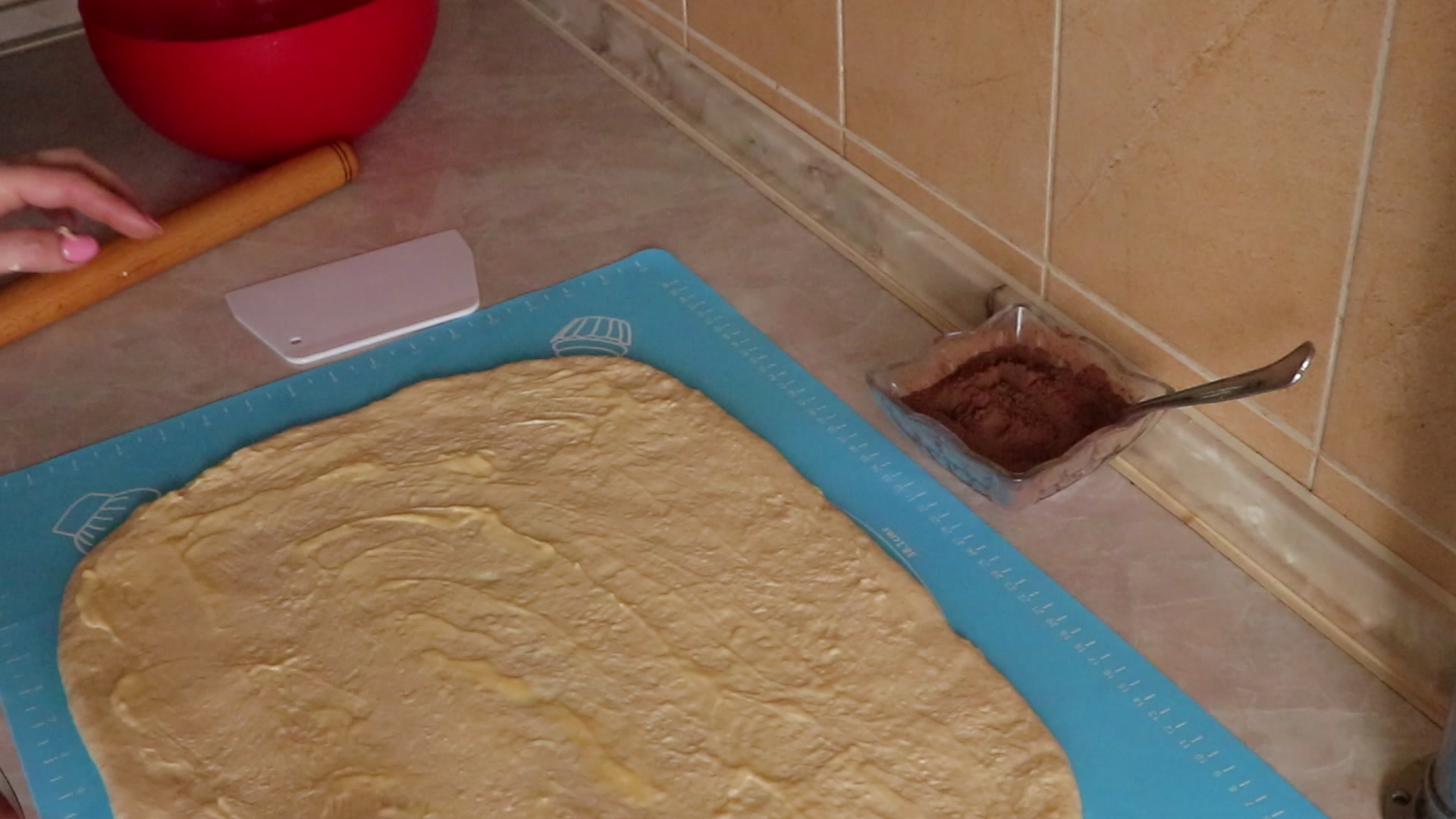 Step 3. Oil the worktop, turn out the dough, shape a ball, then roll into a square. Cinnamon buns with mascarpone icing