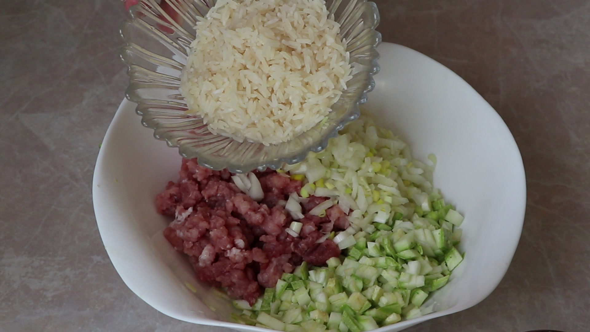 Step 5. Combine finely chopped courgette, raw rice, finely chopped onion and any minced. Courgette ‘cabbage rolls’ in the pan
