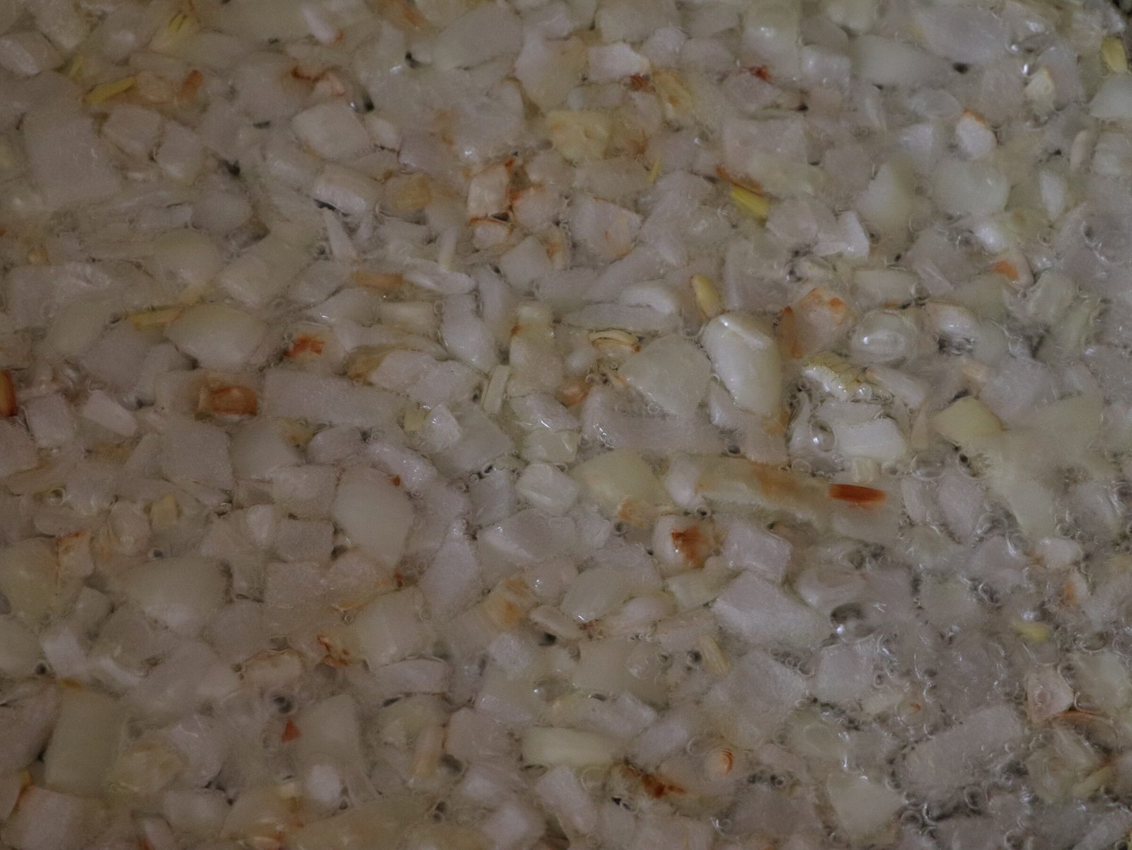 Step 3. In a preheated frying pan, fry the onion until slightly golden brown. Courgette caviar