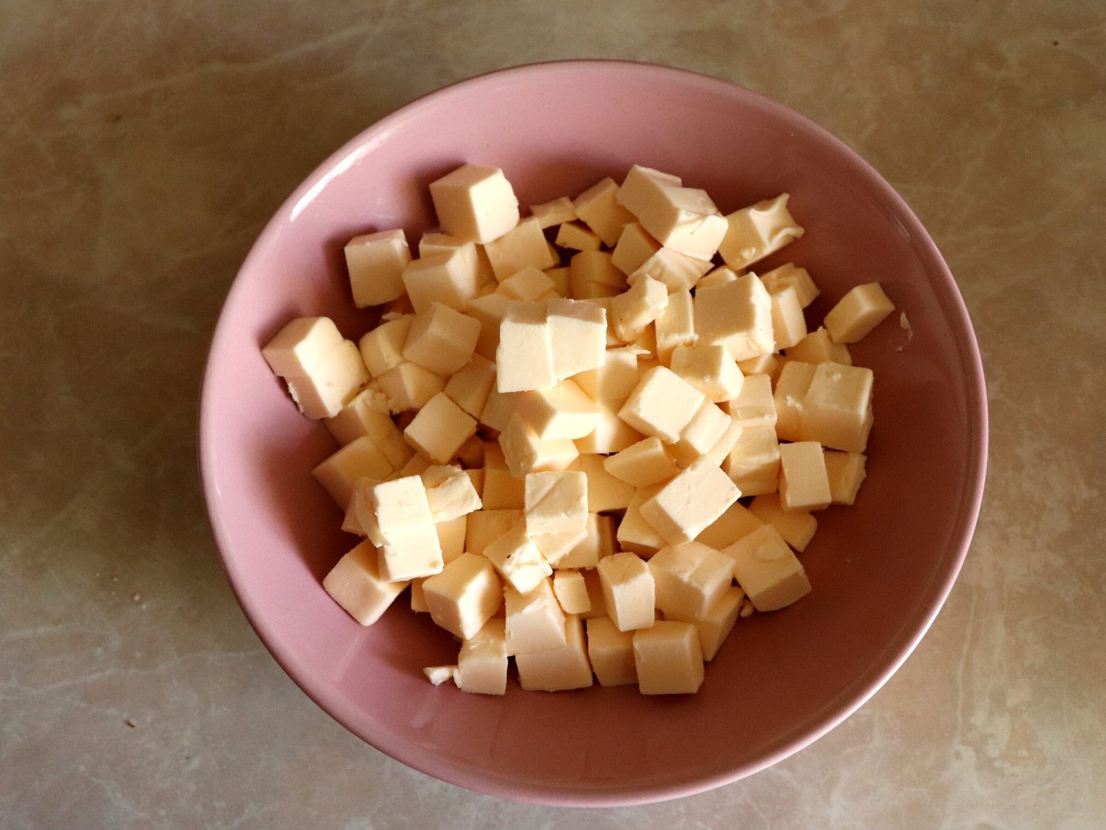 Step 4. While the potatoes are cooking, let's make the cheesecakes. Creamy melted-cheese soup
