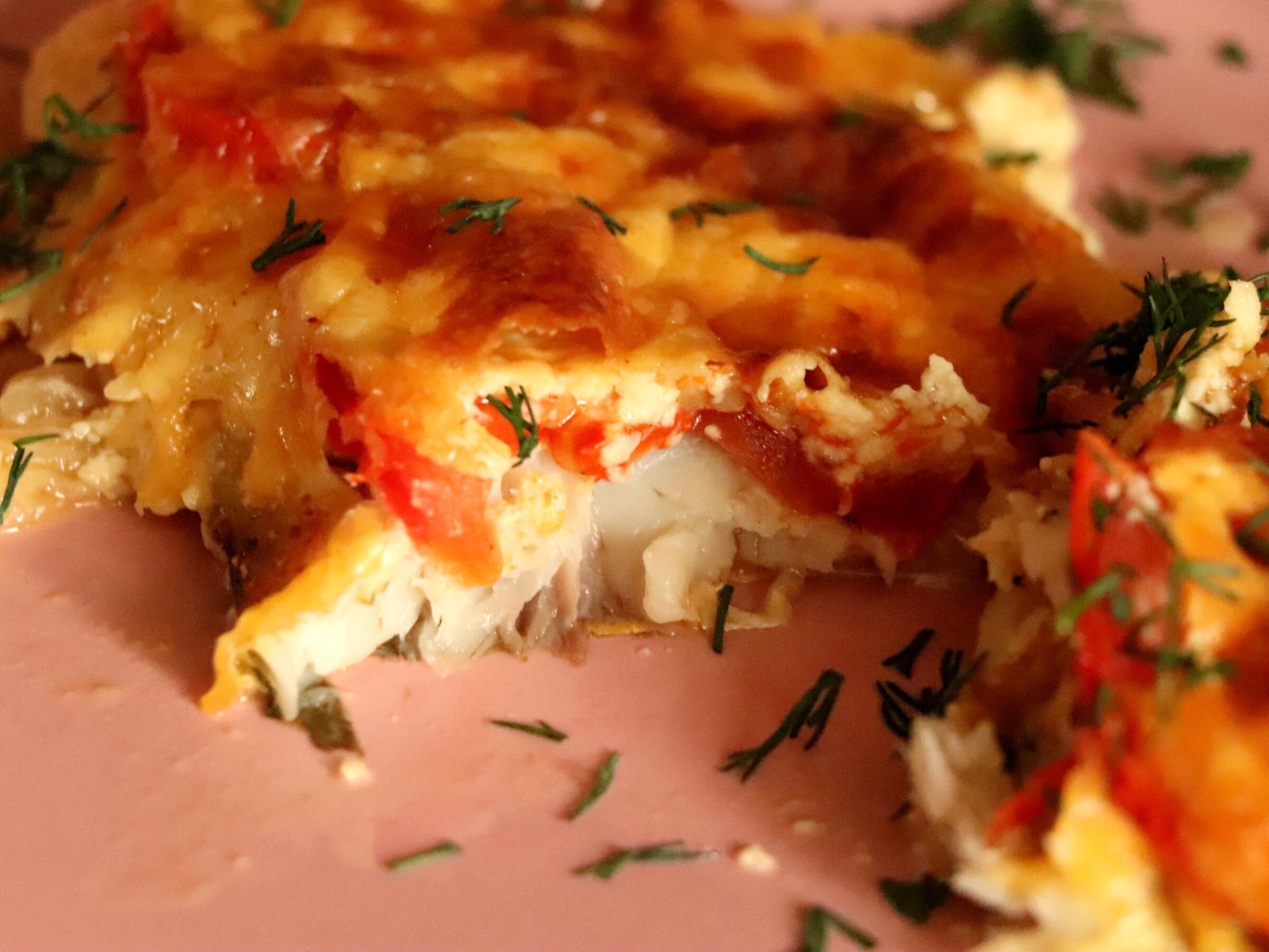 Grey mullet fillets baked with cheese