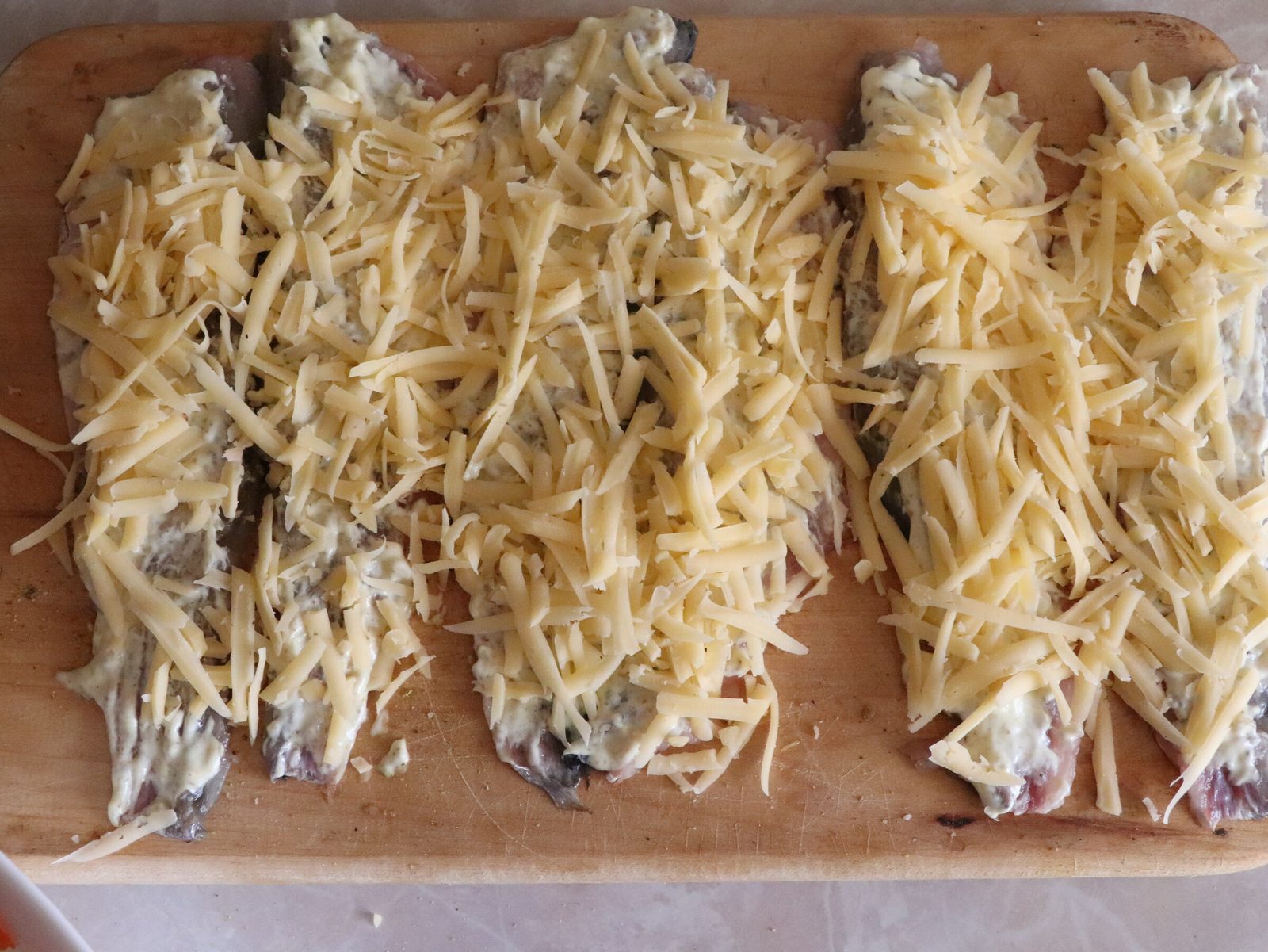 Step 3. Sprinkle the fillets with spices - you can use your favorite fish seasoning, or. Grey mullet rolls with cheese on a bed of