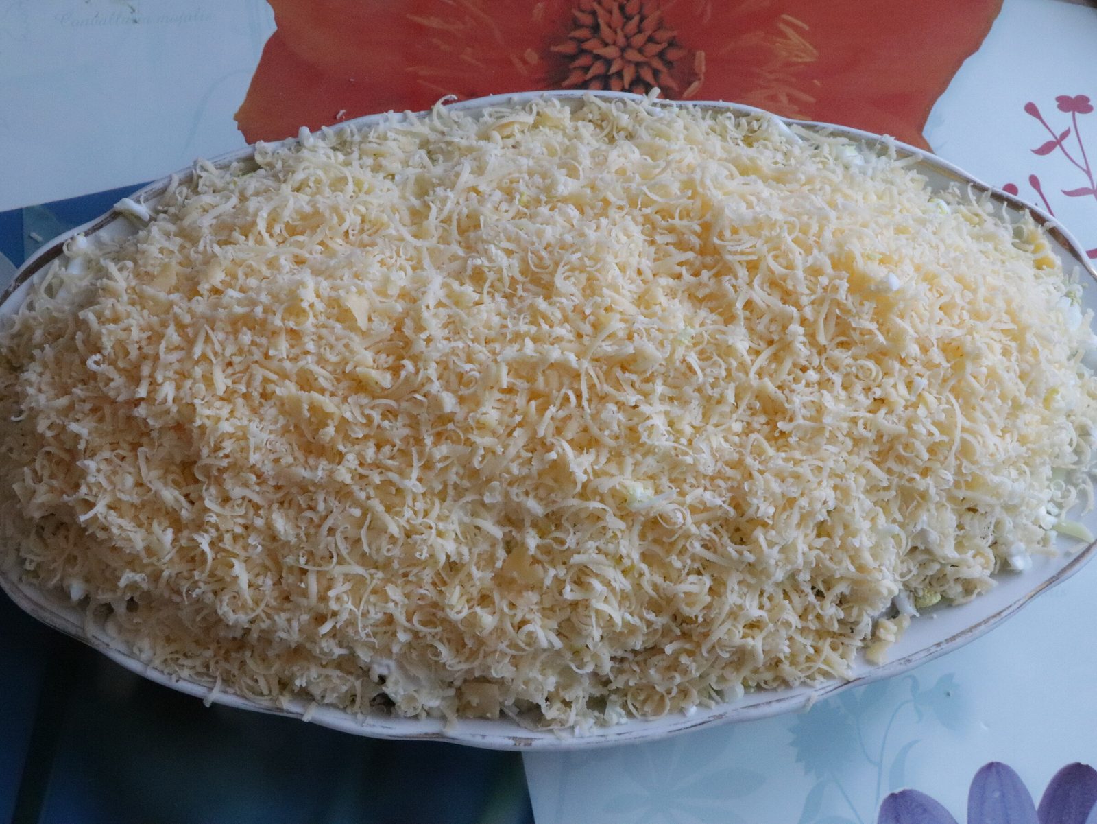 Step 6. Grate potatoes onto the bottom of a dish or plate using a coarse grater and. Herring under a white ‘coat’