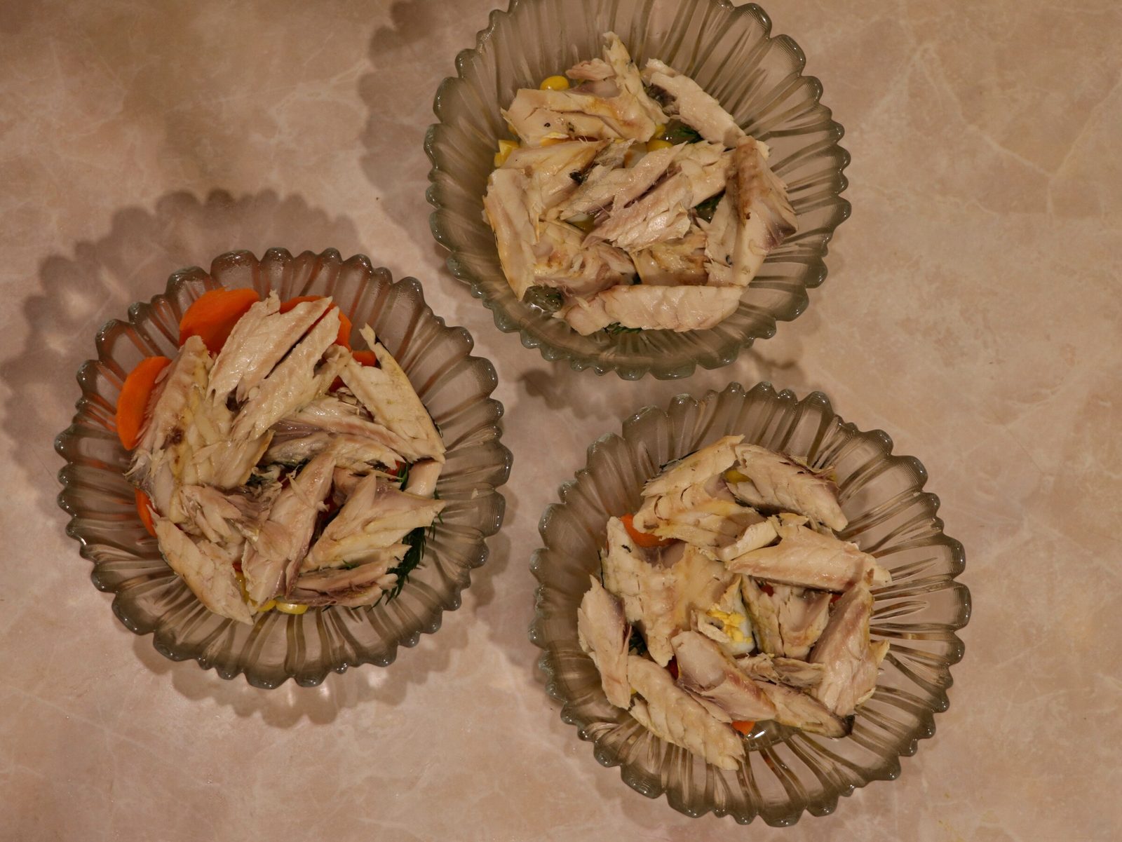 Step 8. Add swollen gelatin to the strained hot broth and mix well until dissolved. Jellied fish