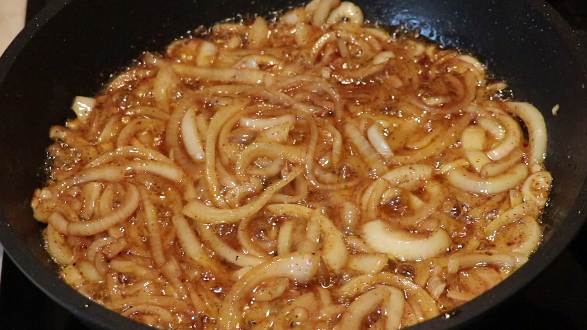 Step 4. Add the onion and cook until translucent. Juicy chicken drumsticks in the pan