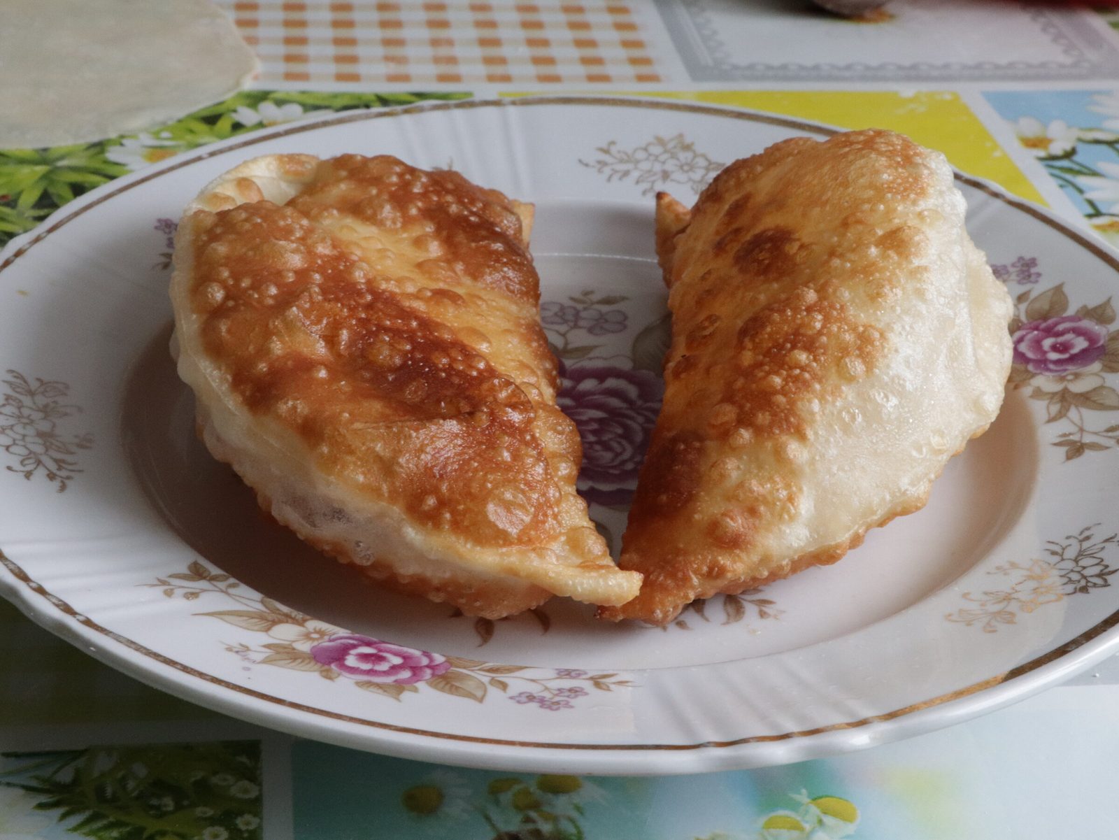 Step 7. It is better to roll out several flat cakes at once, because. Juicy, crisp chebureki