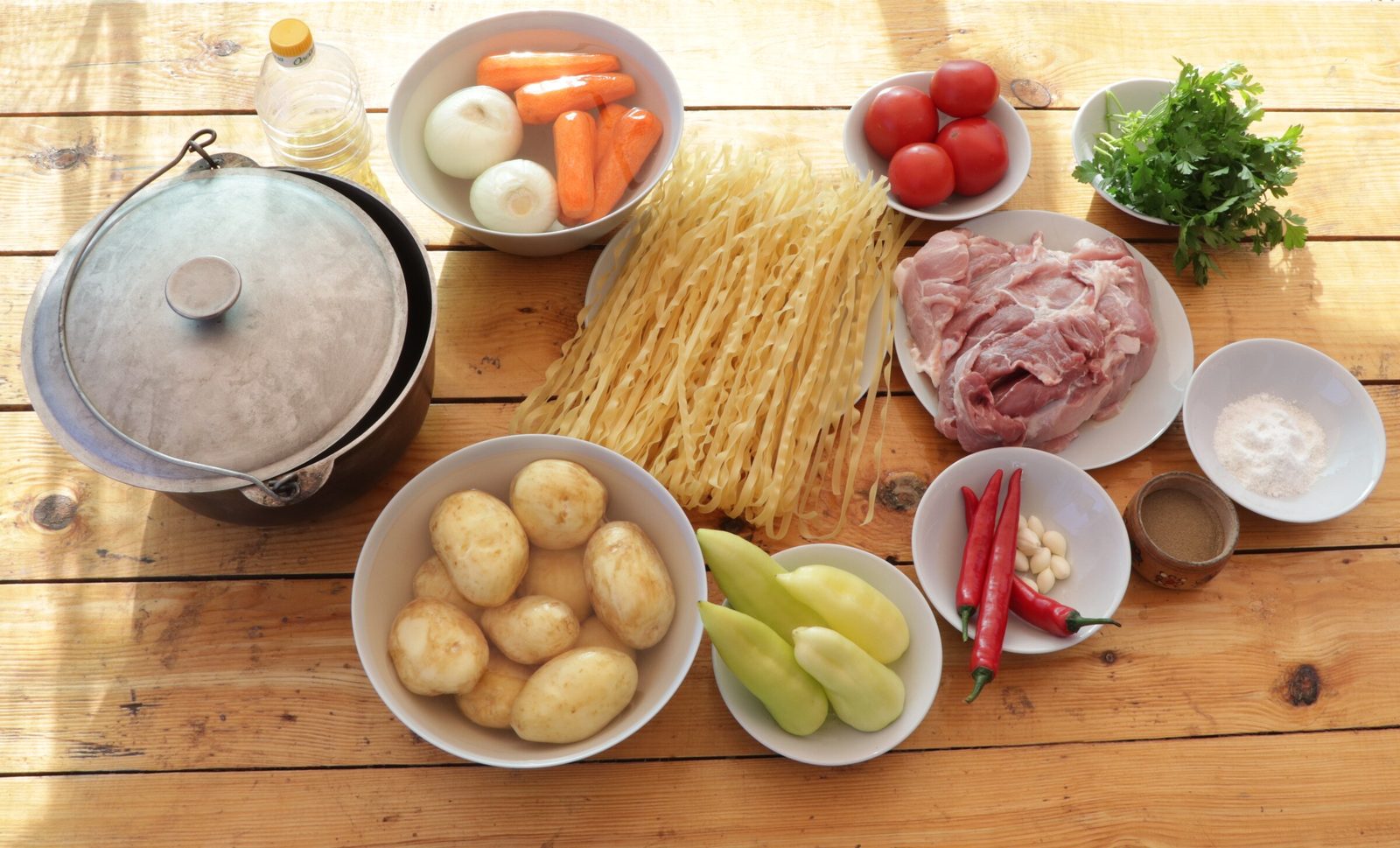 Step 1. First, let's prepare all the components. Lagman in a kazan over the fire