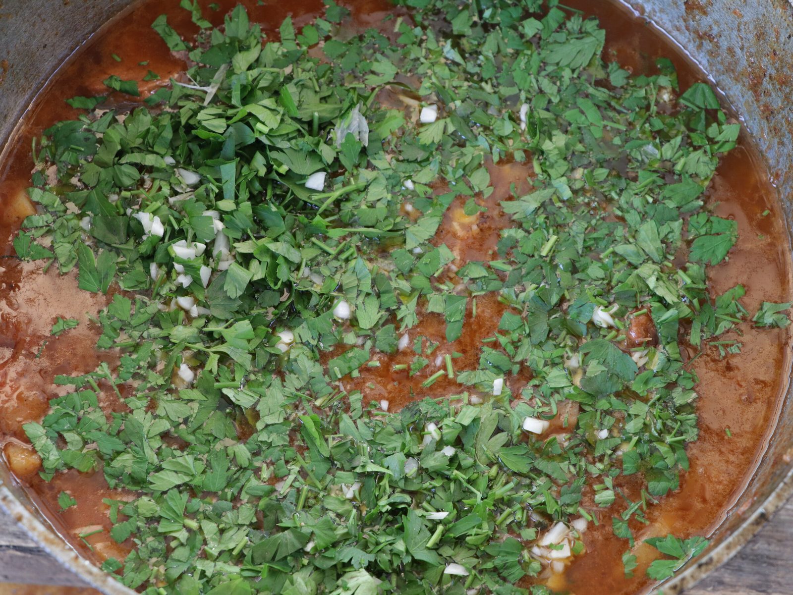 Step 9. In the second case, after the potatoes are ready, remove the cauldron from the. Lagman in a kazan over the fire