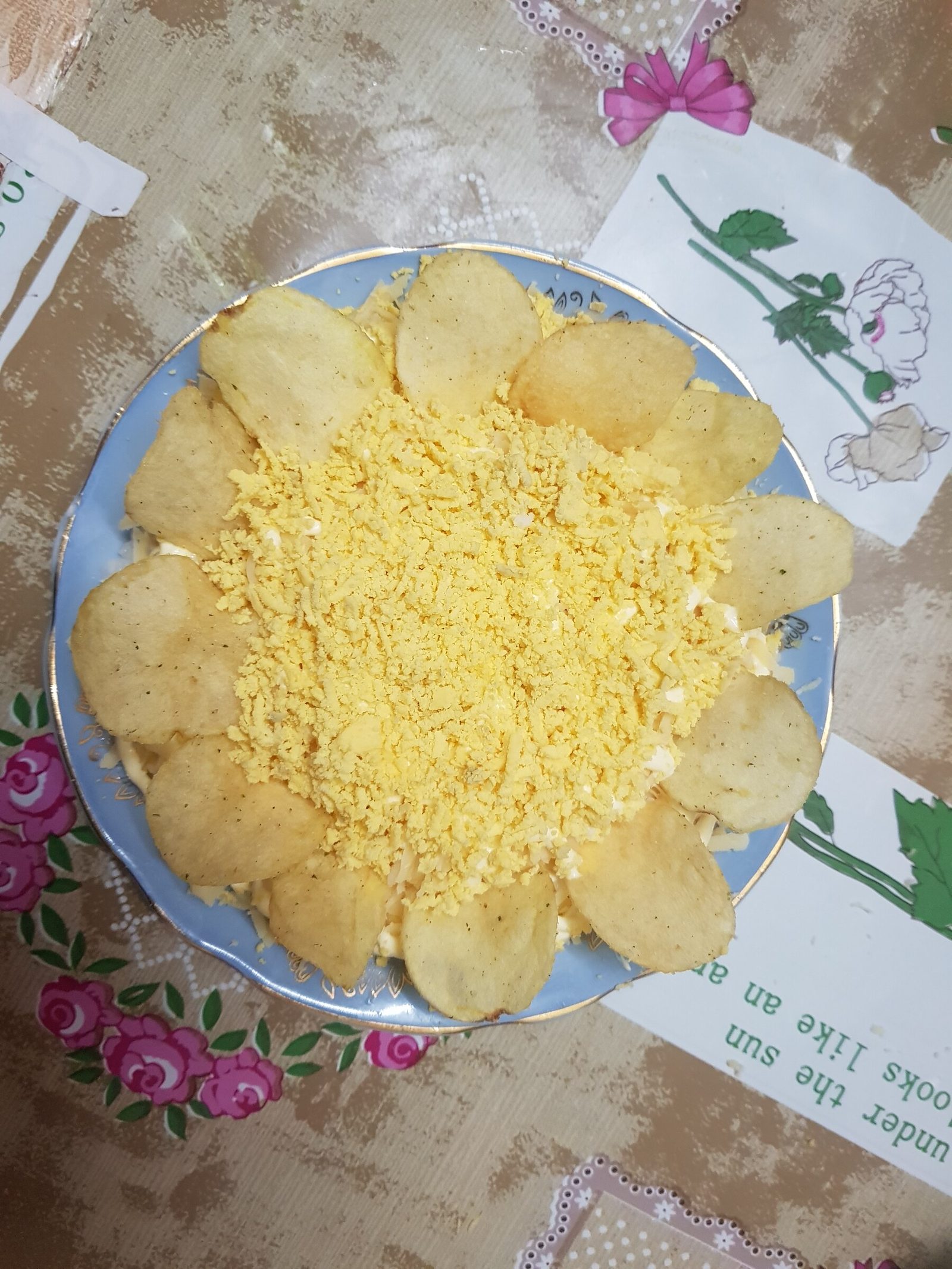 Layered ‘Sunflower’ fish salad