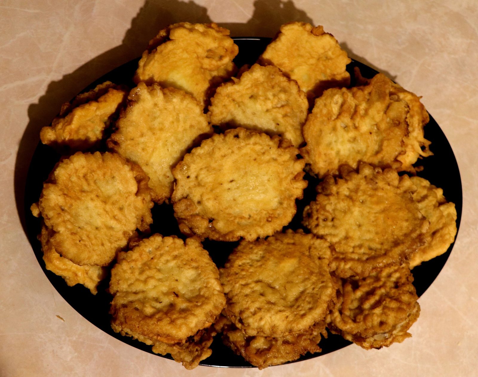 Step 4. Place in a heated frying pan with plenty of vegetable oil. Lazy chebureki — no rolling pin