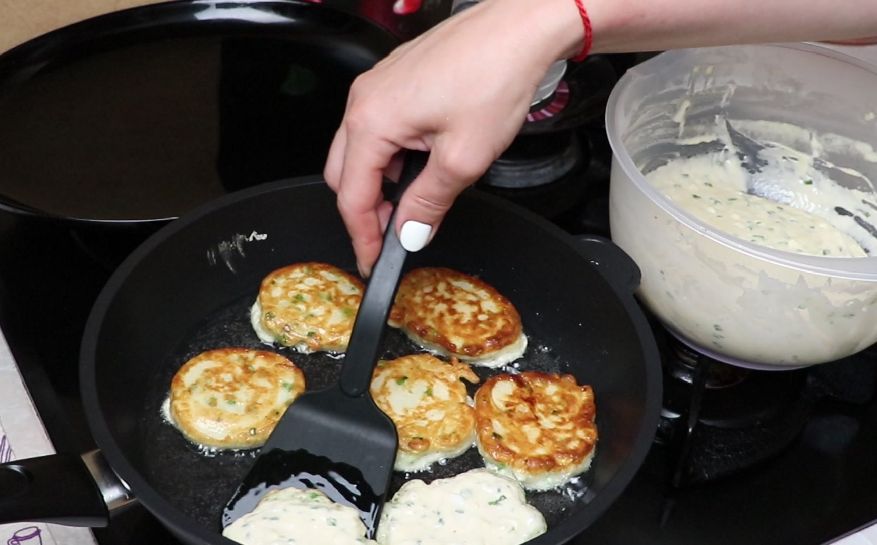 Step 7. Heat sunflower oil in a deep, heavy pan. Lazy onion-and-egg fritters