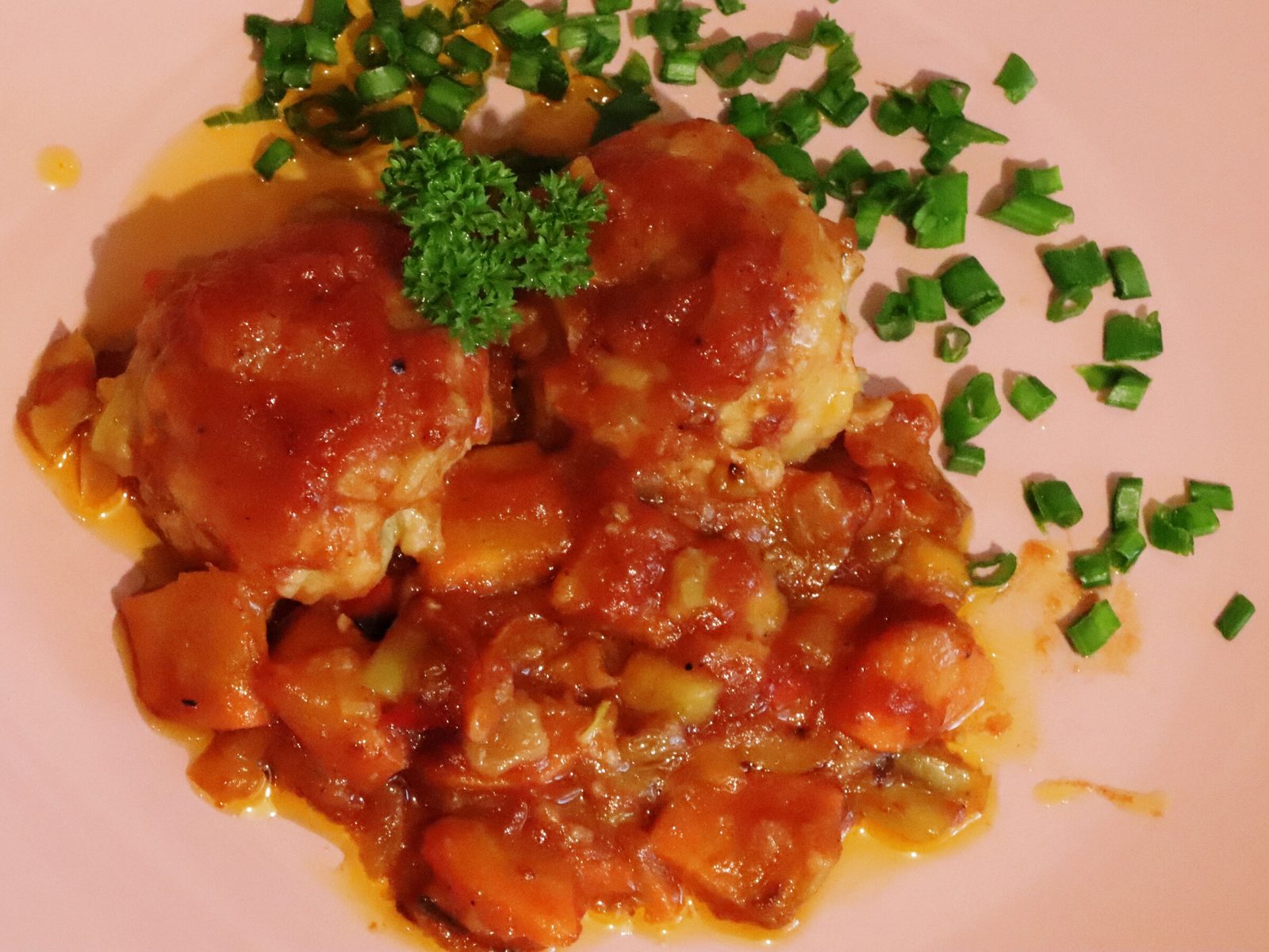 Meatballs with vegetables in tomato sauce