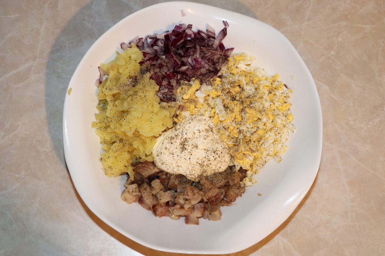 Step 2. For the balls, cut the herring fillet into small cubes, grate the eggs and. New Year ‘bauble’ starters