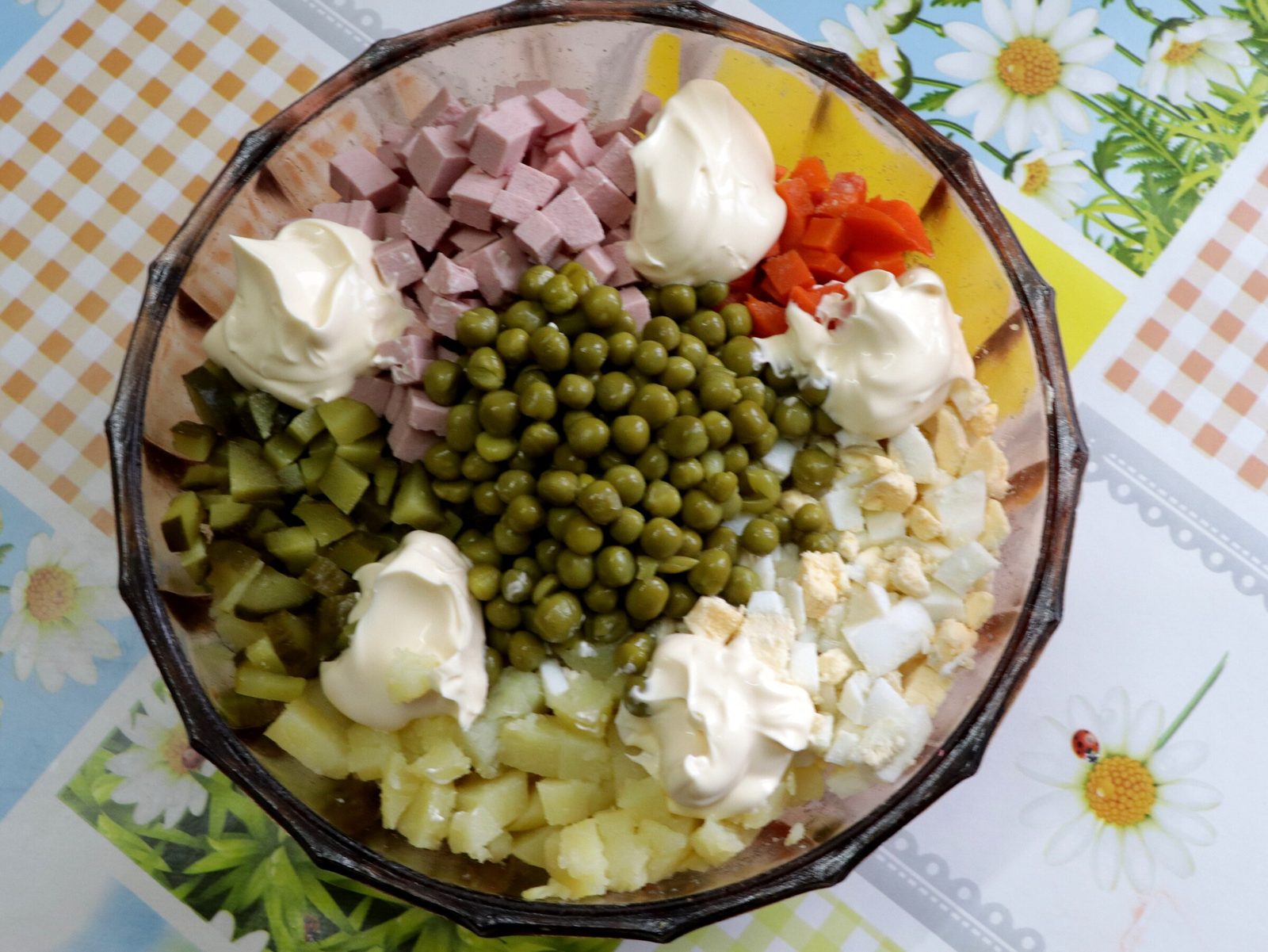 Step 6. Salt lightly if you need to — it depends how salty the cucumbers are. Olivier salad