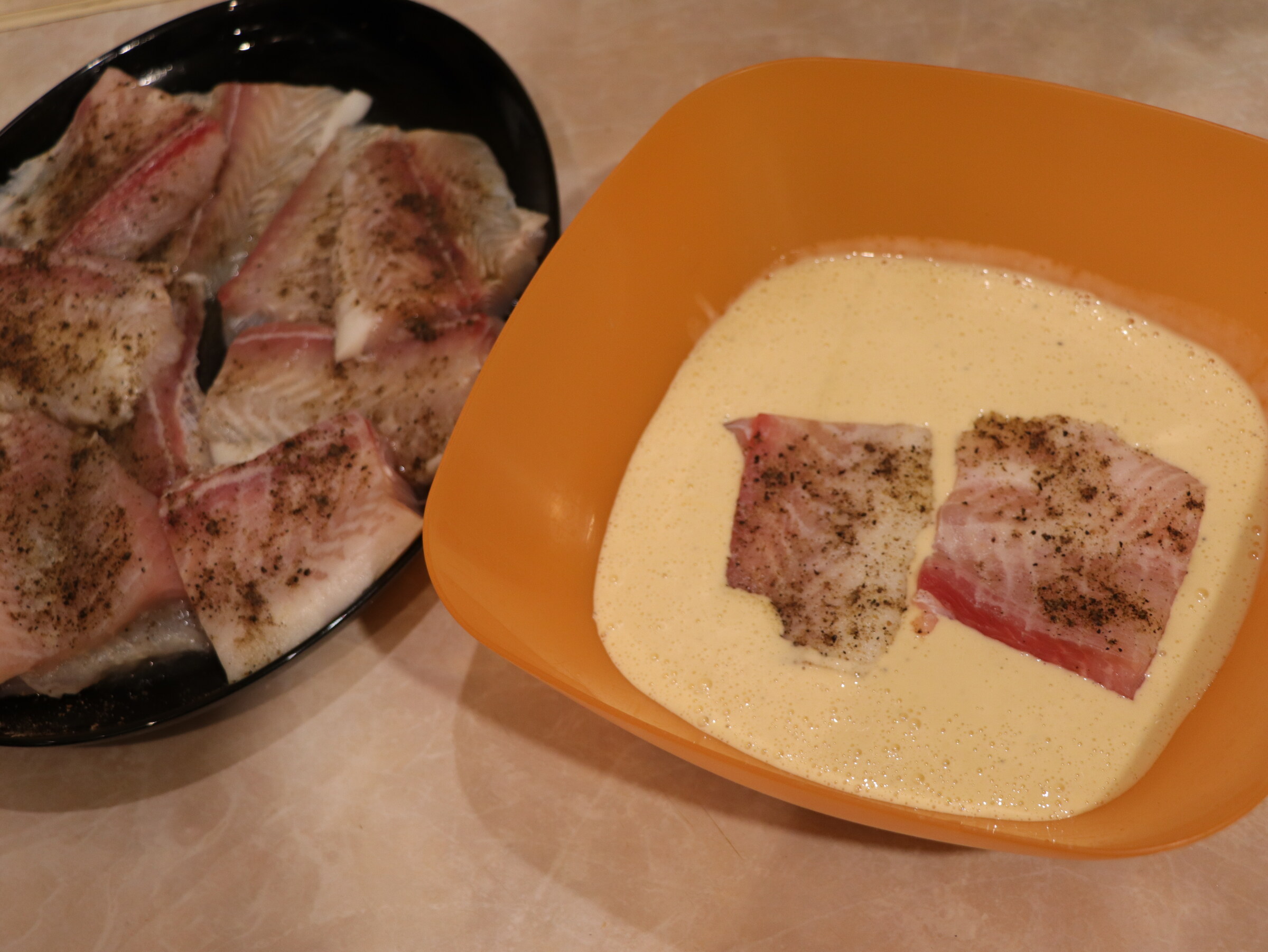 Step 5. Dip each piece in batter and place in hot oil. Pangasius fillet in batter