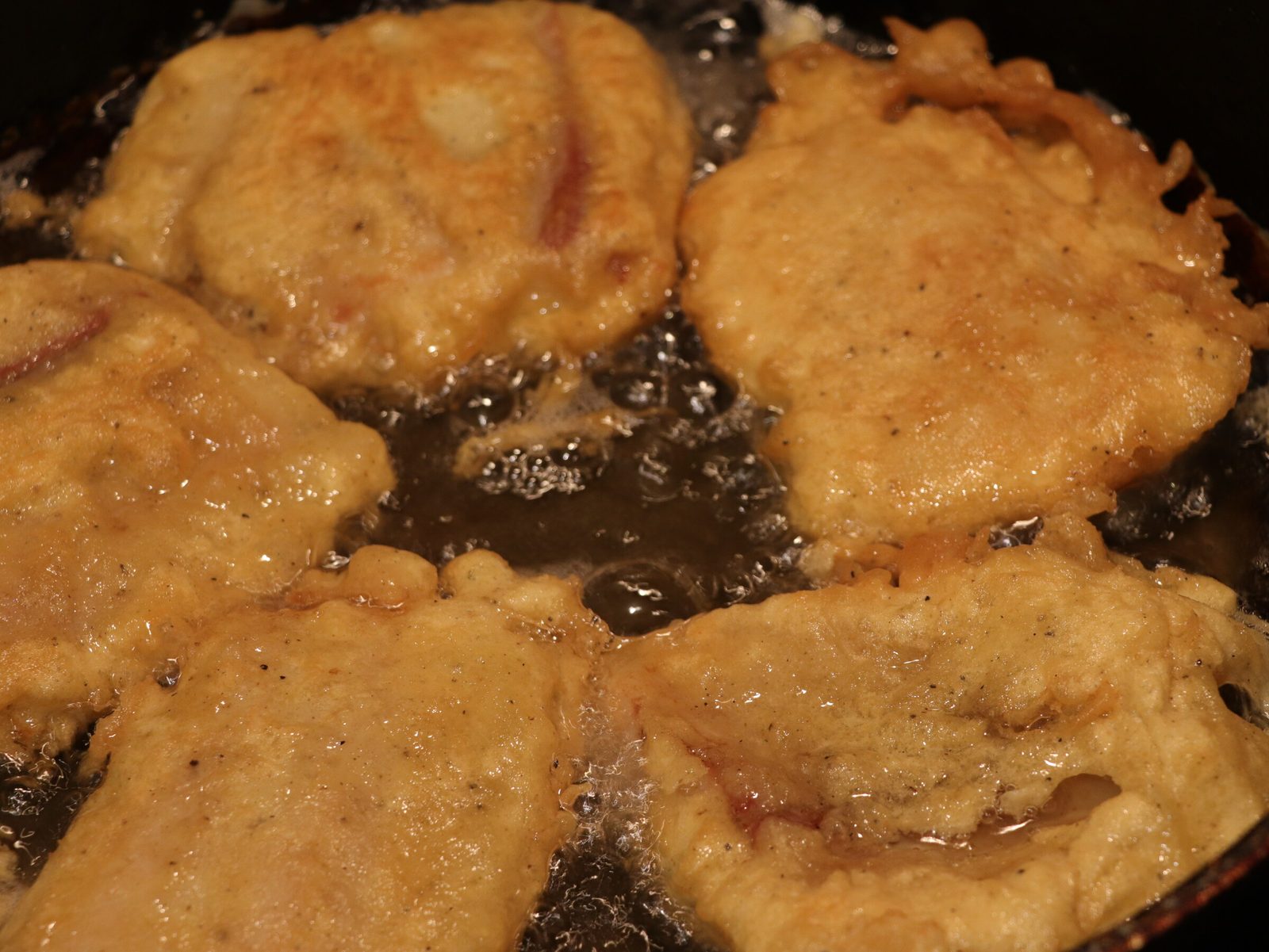Step 6. Fry on both sides until golden brown. Pangasius fillet in batter