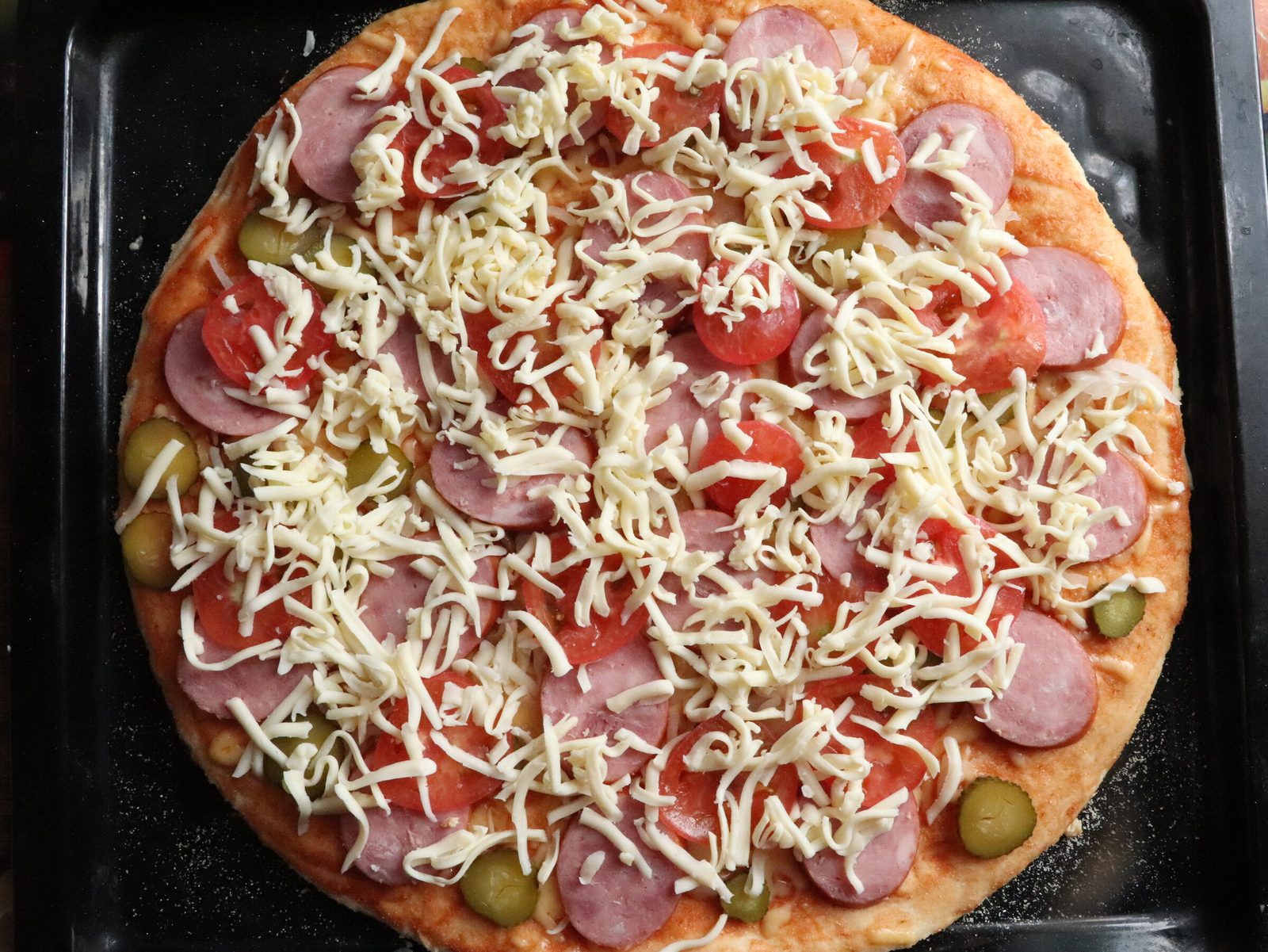 Step 4. I divided the finished dough into 2 parts and I got 2 large pizzas with a. Pizza