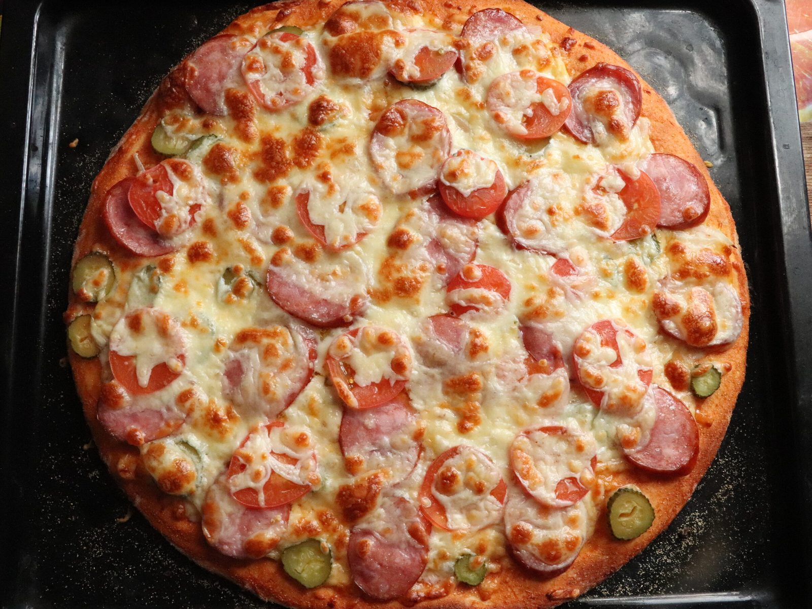 Step 5. When rolling out the dough, it is better to add corn flour - it will give a. Pizza