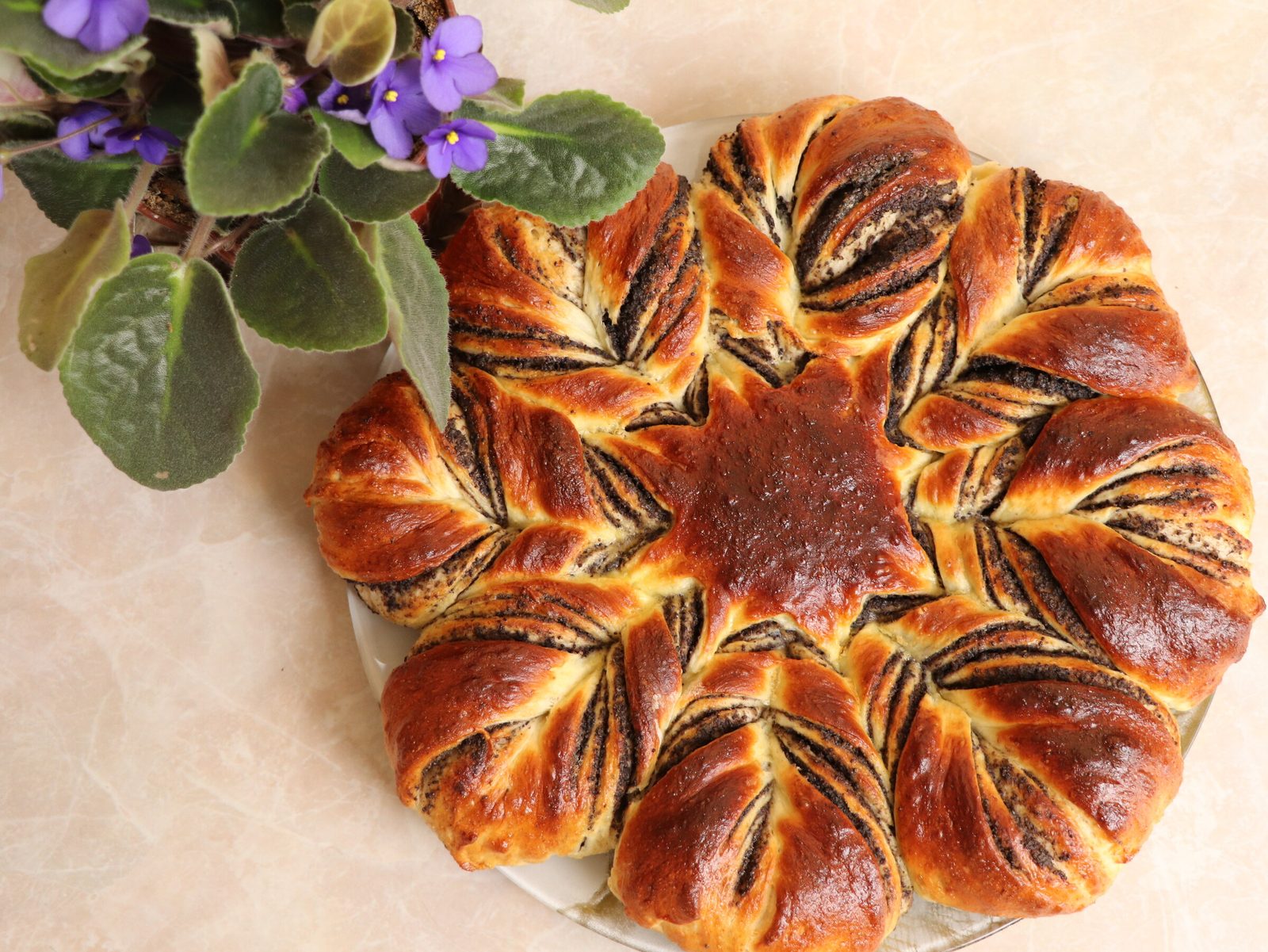 Poppy-seed flower loaf on cloud-soft yeast dough