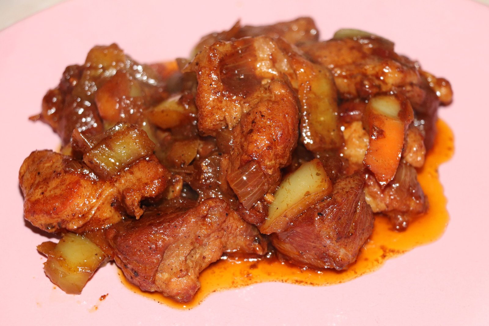Pork goulash with peppers and tomatoes
