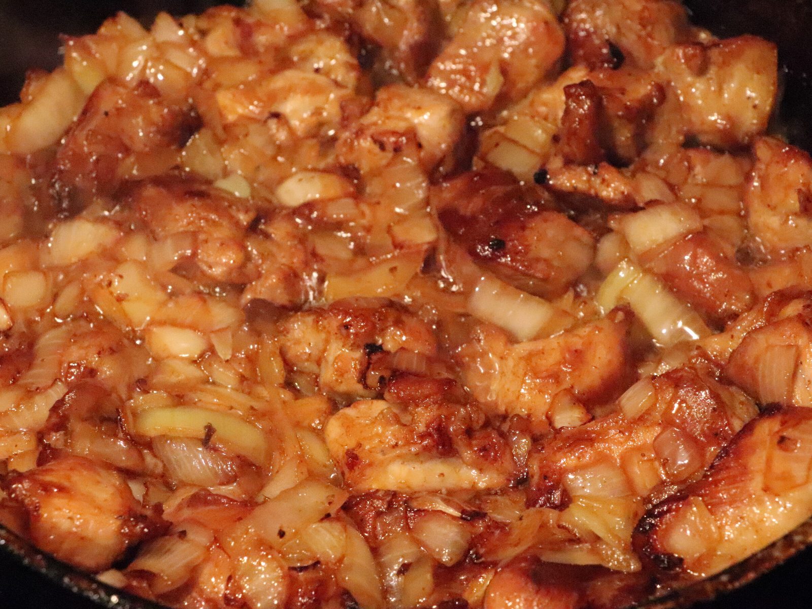 Step 2. Place diced onion on top of the meat and stir after a couple of minutes. Pork goulash with peppers and tomatoes