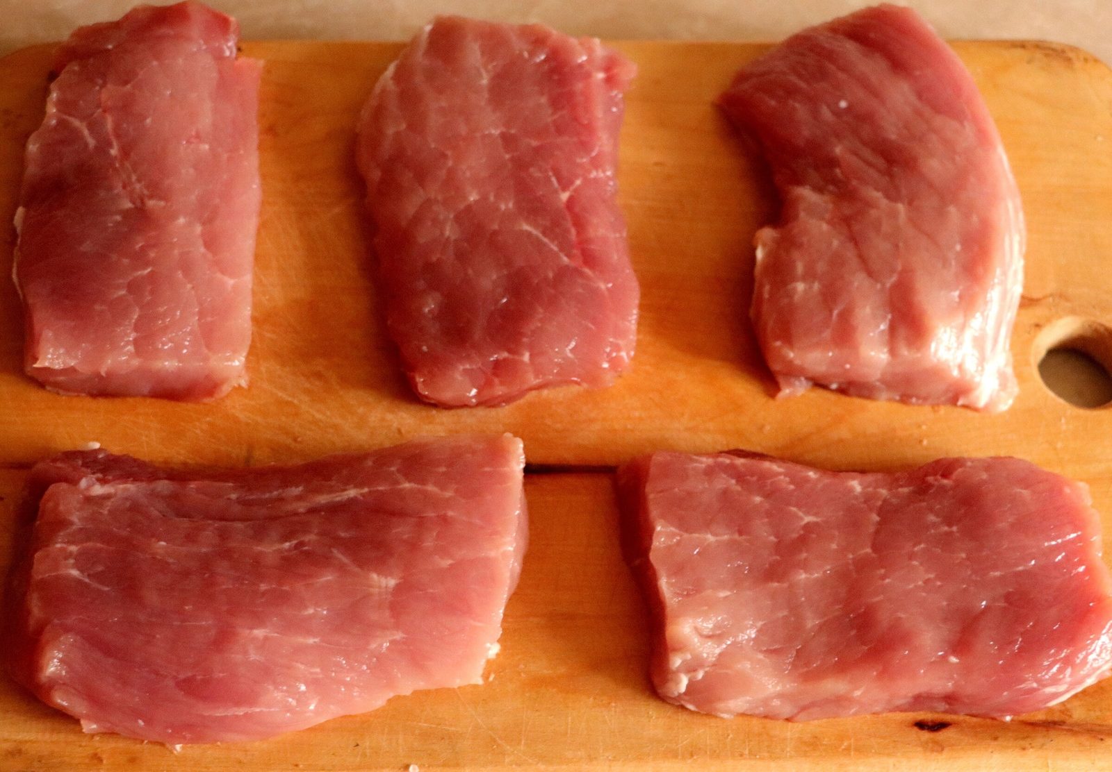 Step 2. Place the pork steaks in a deep bowl and sprinkle with your favorite spices to. Pork steak, well done