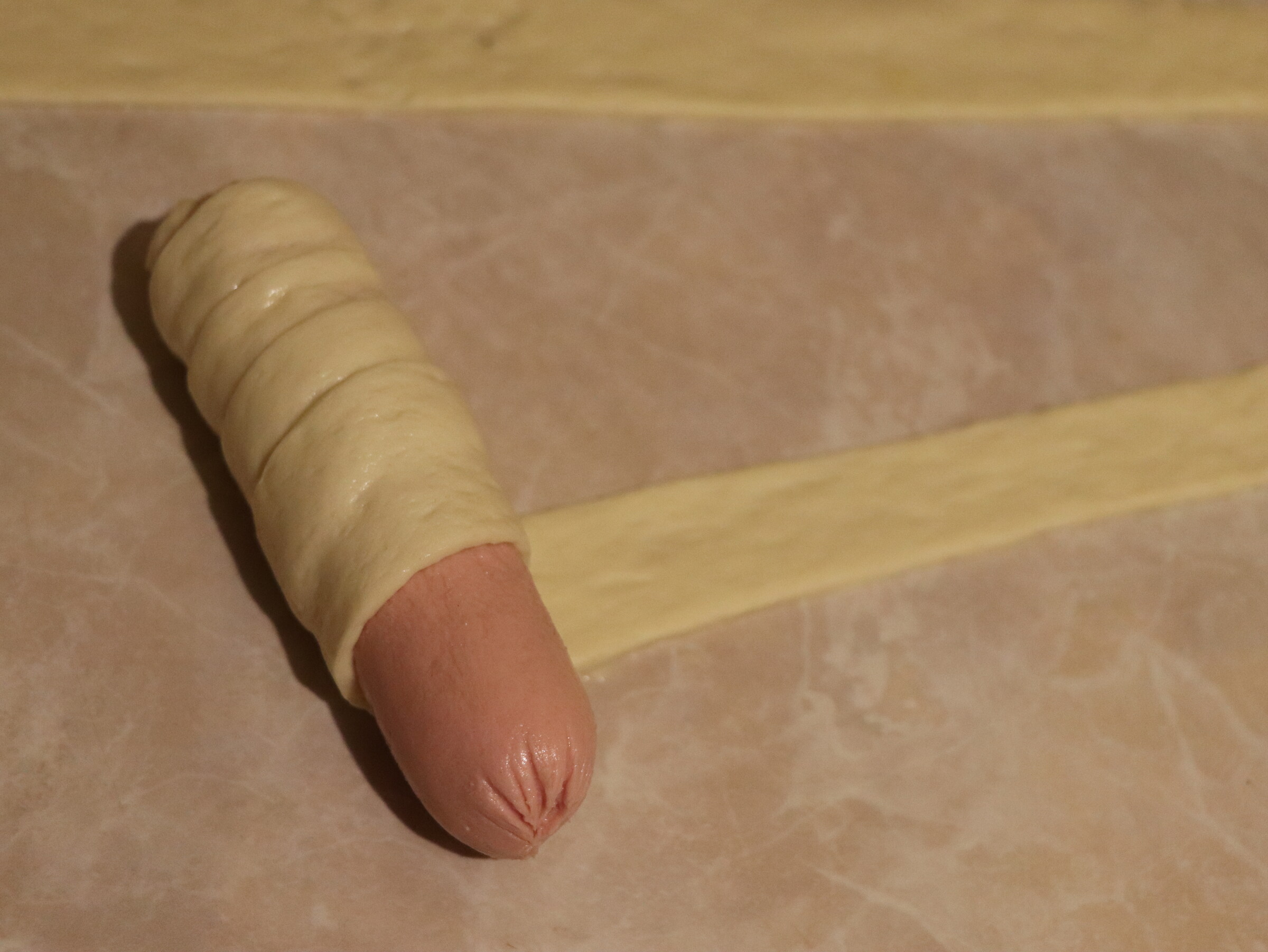 Step 3. When the dough has doubled in size, knead it with your hands and leave for. Sausage rolls