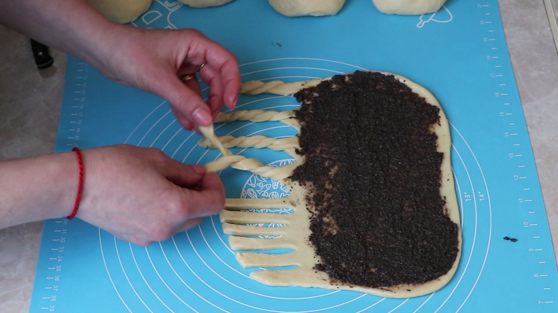 Step 6. Cut some of the dough without filling into strips. Soft poppy-seed rolls