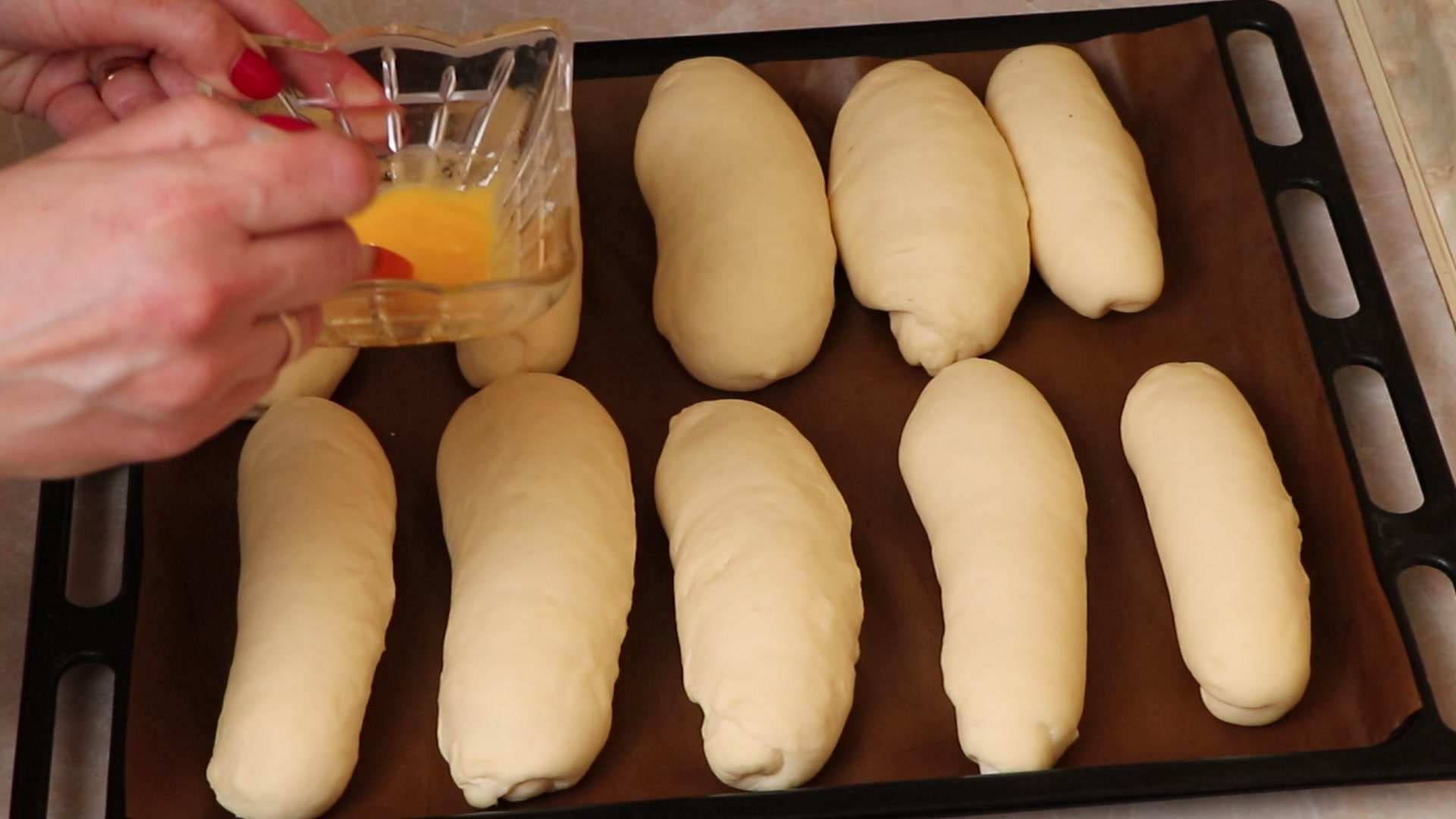 Step 7. Then we form the dough into a sausage and divide it into parts. Soft rolls for sandwiches