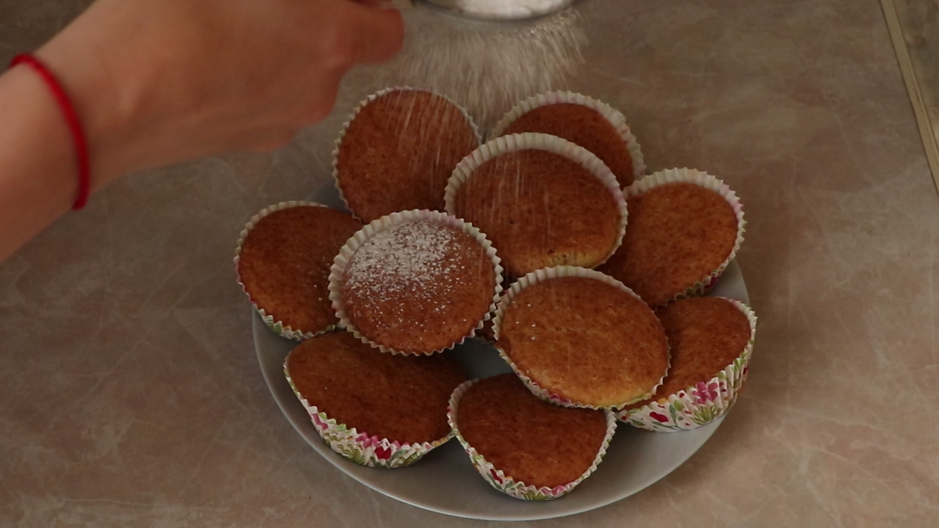 Step 7. Bake at 180°C for about 30 minutes; check with a skewer. Soured-cream fairy cakes for tea