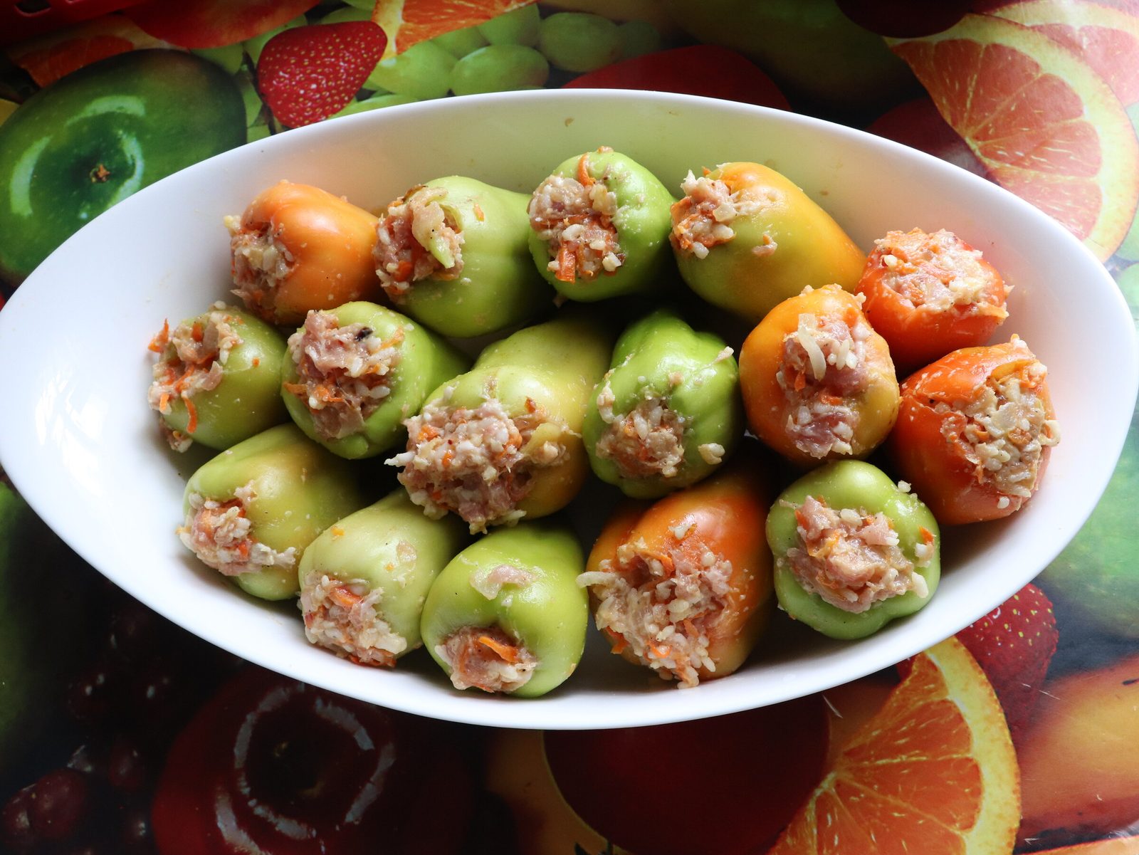 Stuffed peppers in a tomato dressing