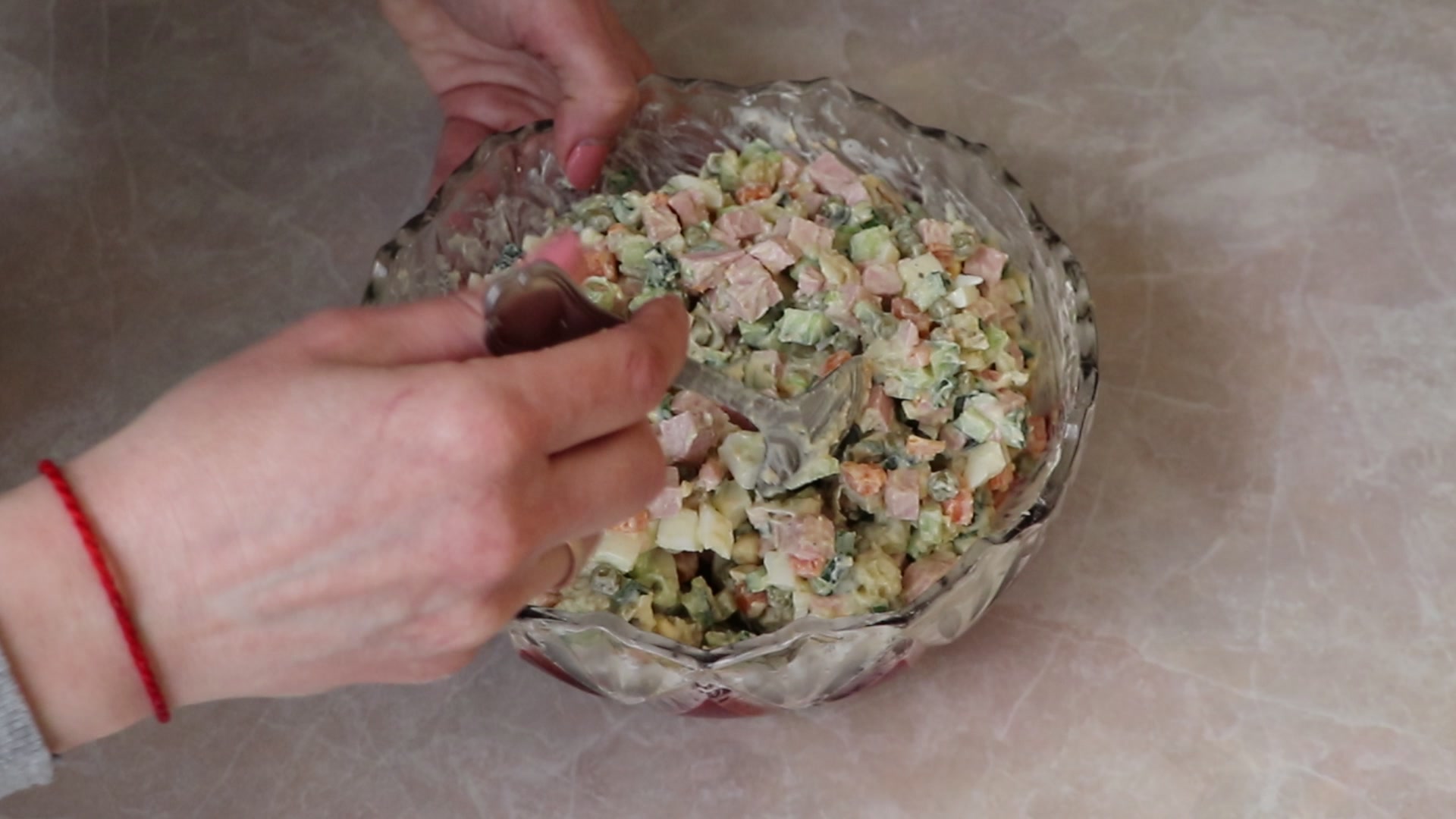 Step 4. Season with salt and pepper and mix well. Summer Olivier salad