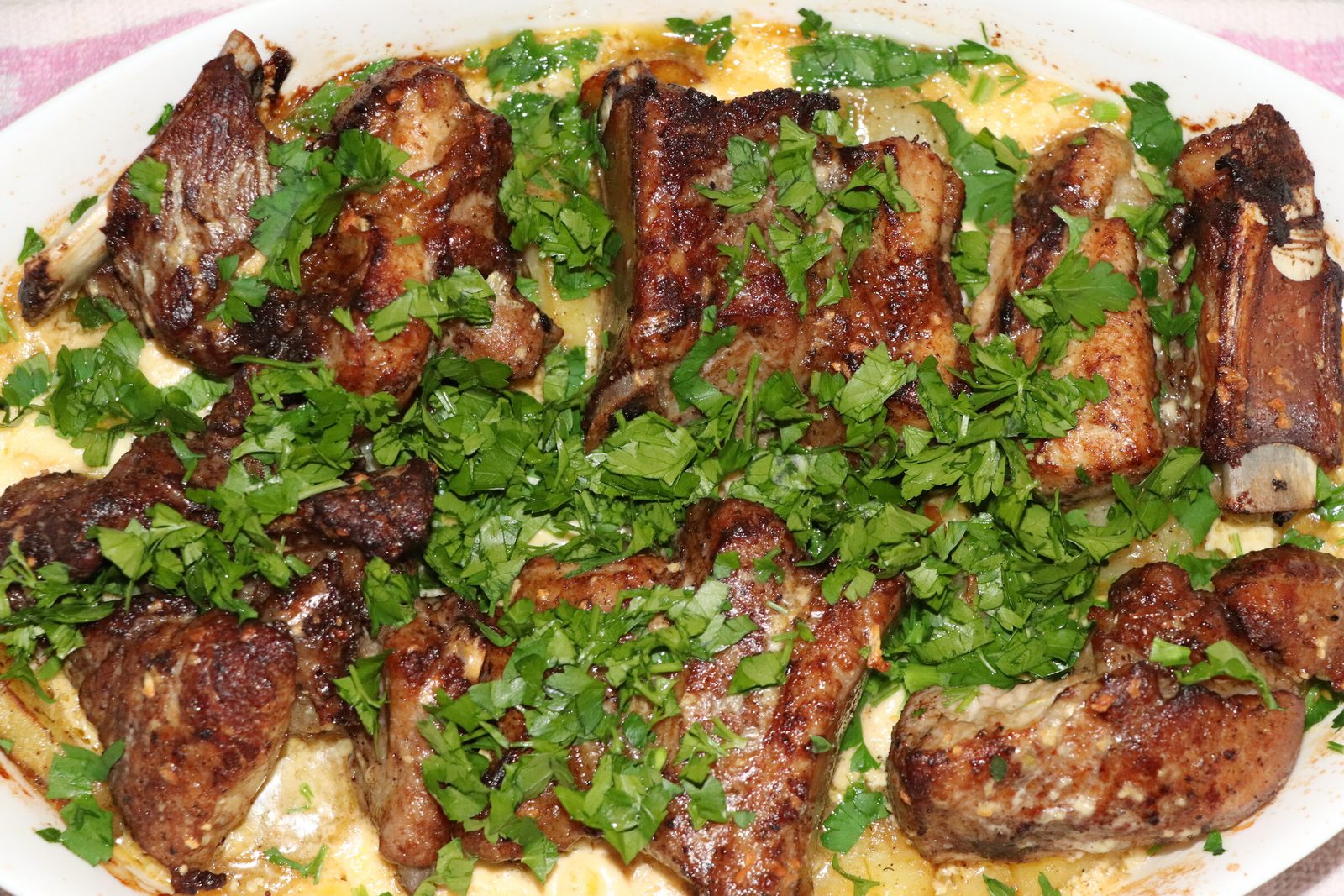 Tender ribs on a potato bed