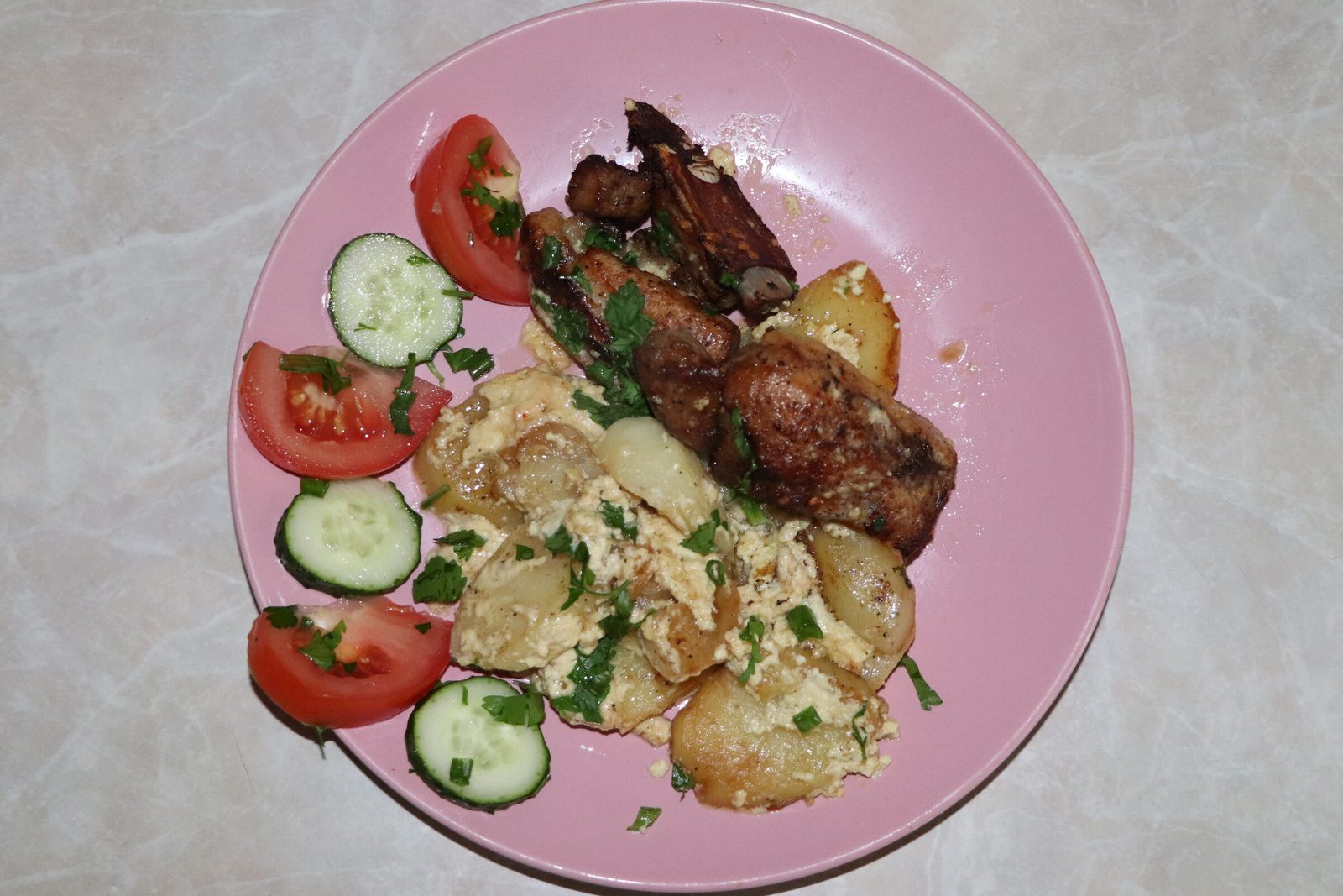 Step 4. Fry the marinated ribs in a well-heated frying pan over high heat until golden. Tender ribs on a potato bed