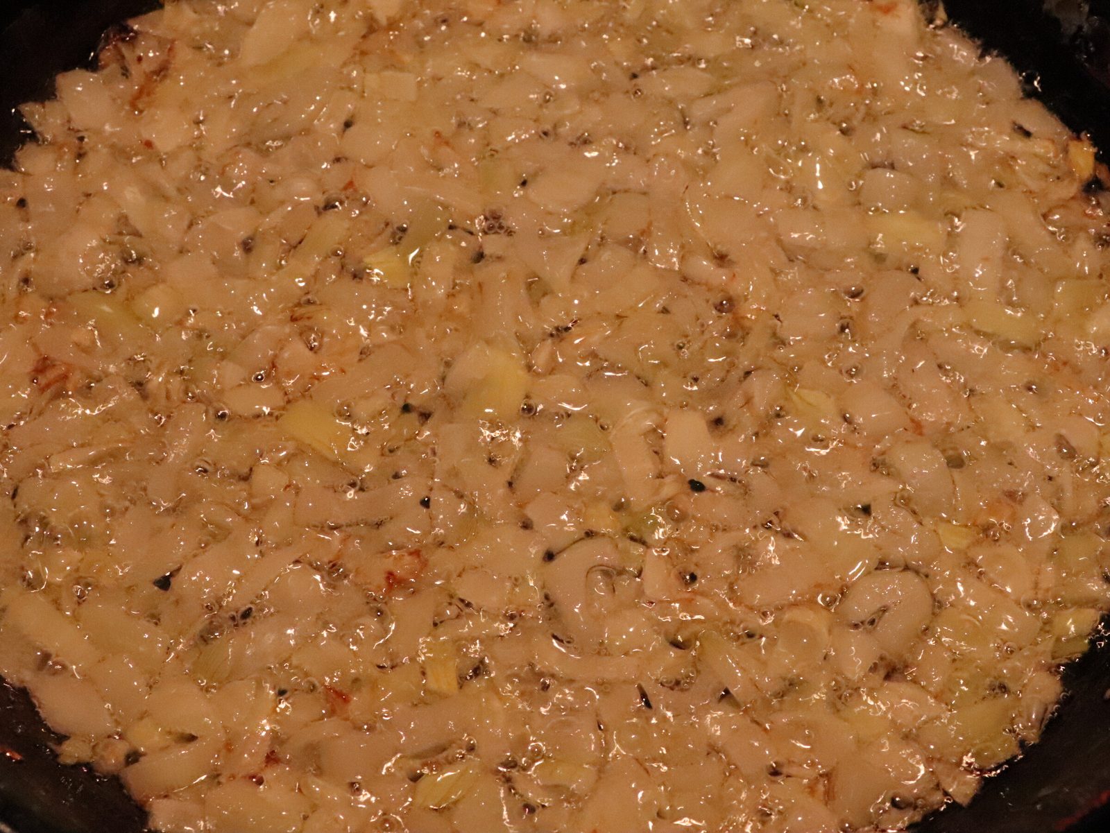Step 2. Dice the onion and fry in oil until translucent or lightly gold. The best braised cabbage