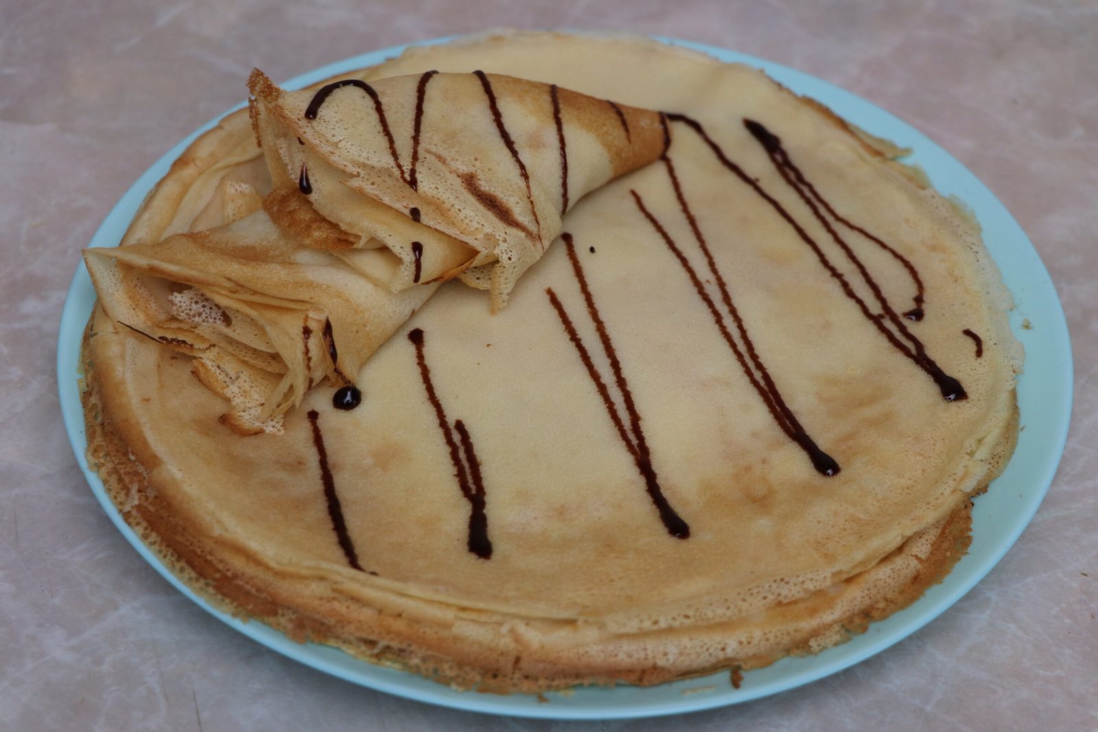 Thin savoury pancakes made with boiling water