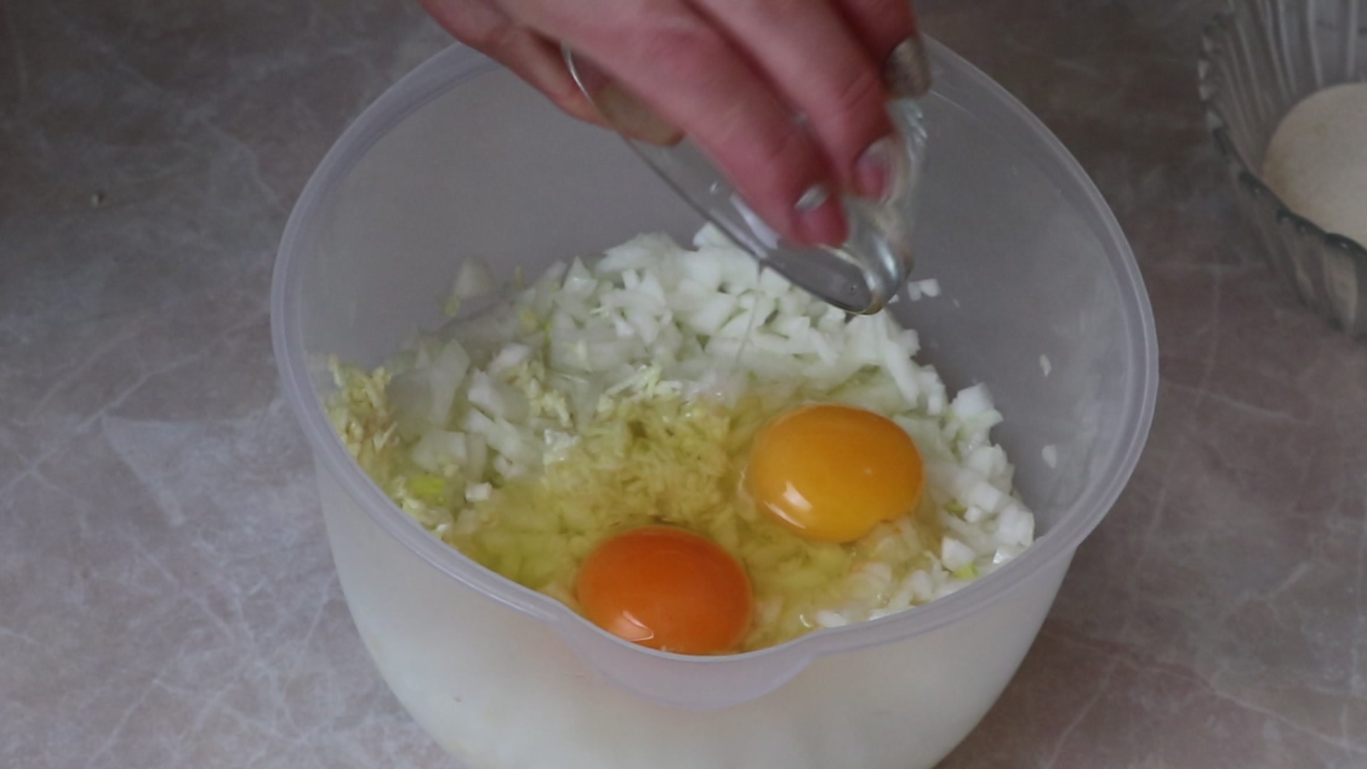 Step 3. Grind the garlic with the onion - you can grate it, chop it finely or put it. Thrifty rissoles — nobody guesses what’s
