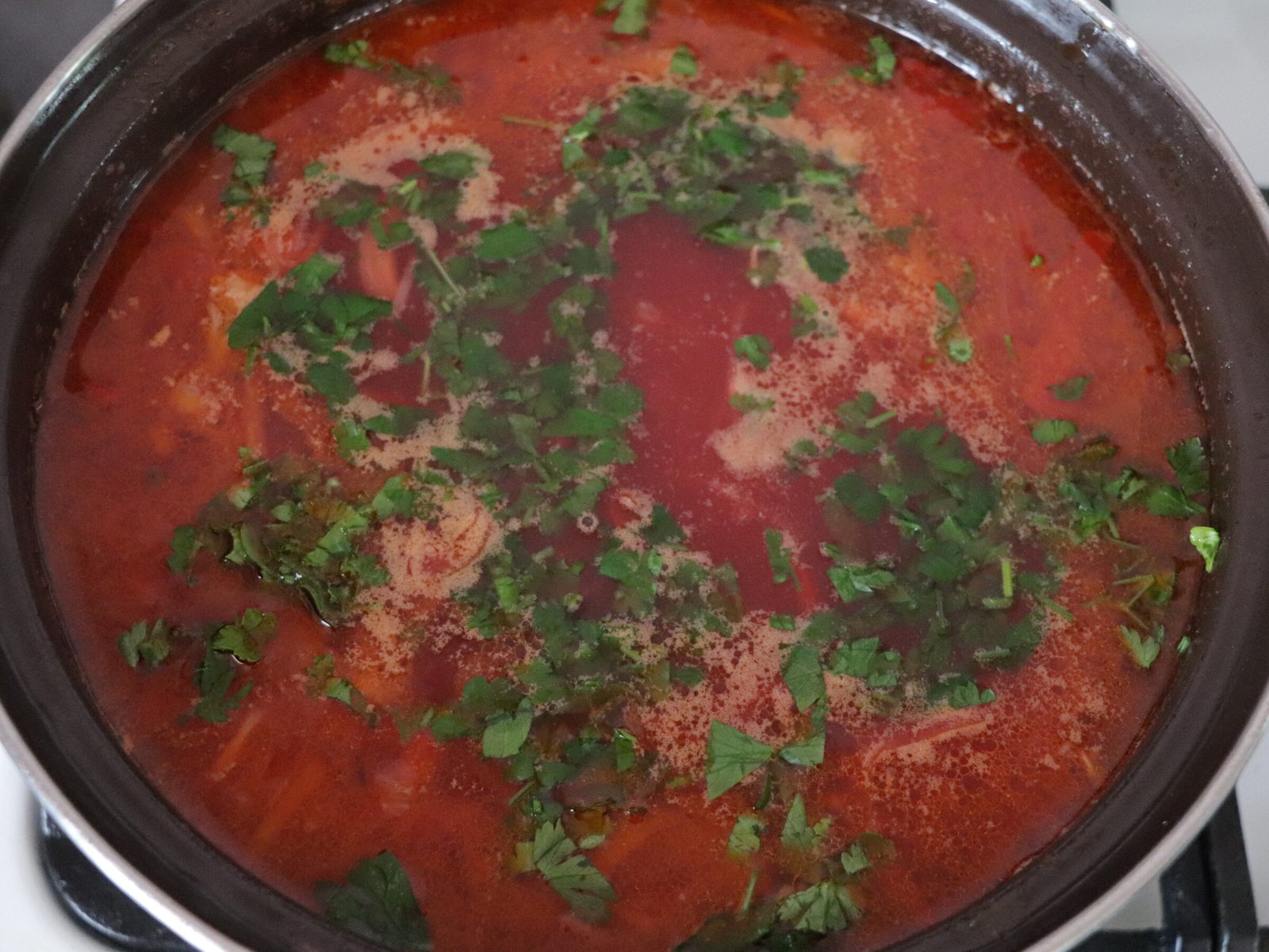 Step 7. Off the heat, add finely chopped dill and parsley. Ukrainian borscht